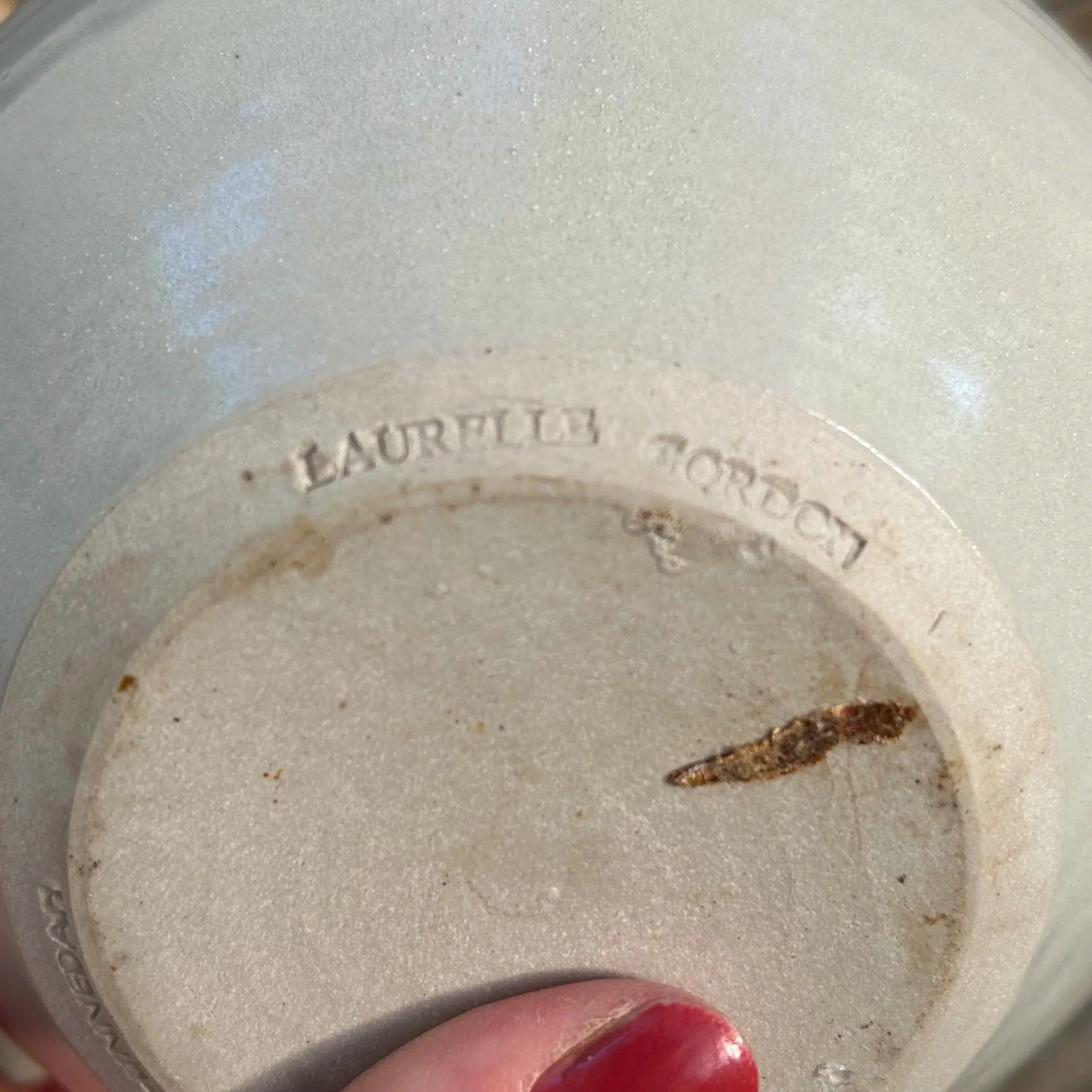 Close-up of base showing “Laurelle Gordon” impressed stamp