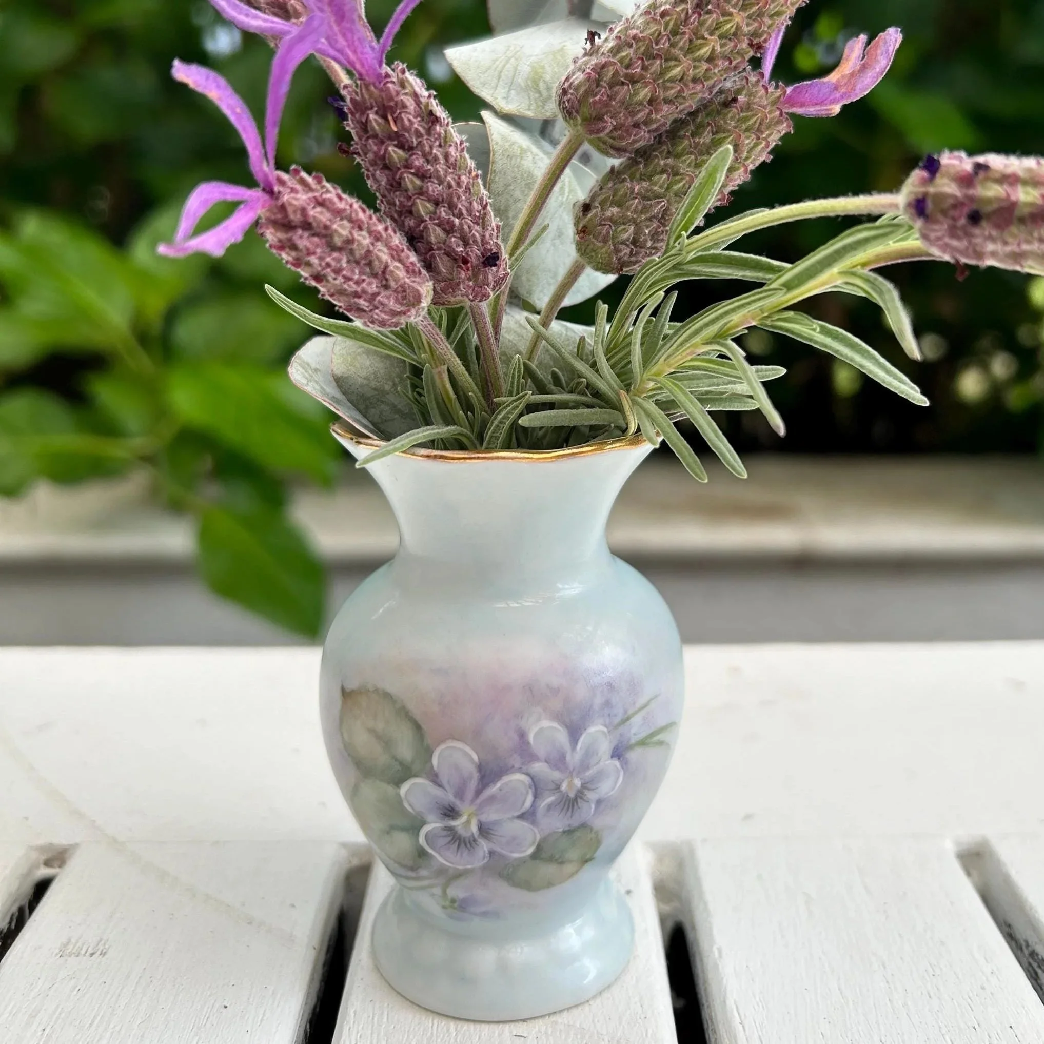 Vase filled with dried lavender and foliage, showing full arrangement