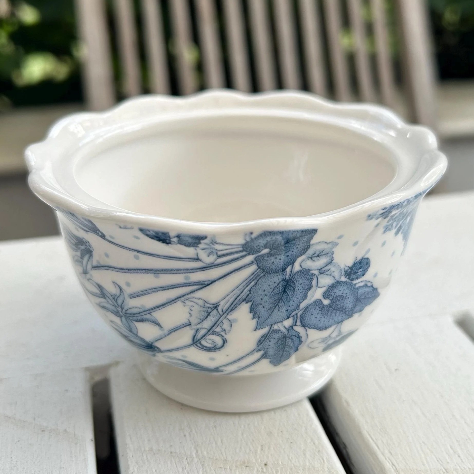 Bowl base without lid showing clean white interior and fluted edge