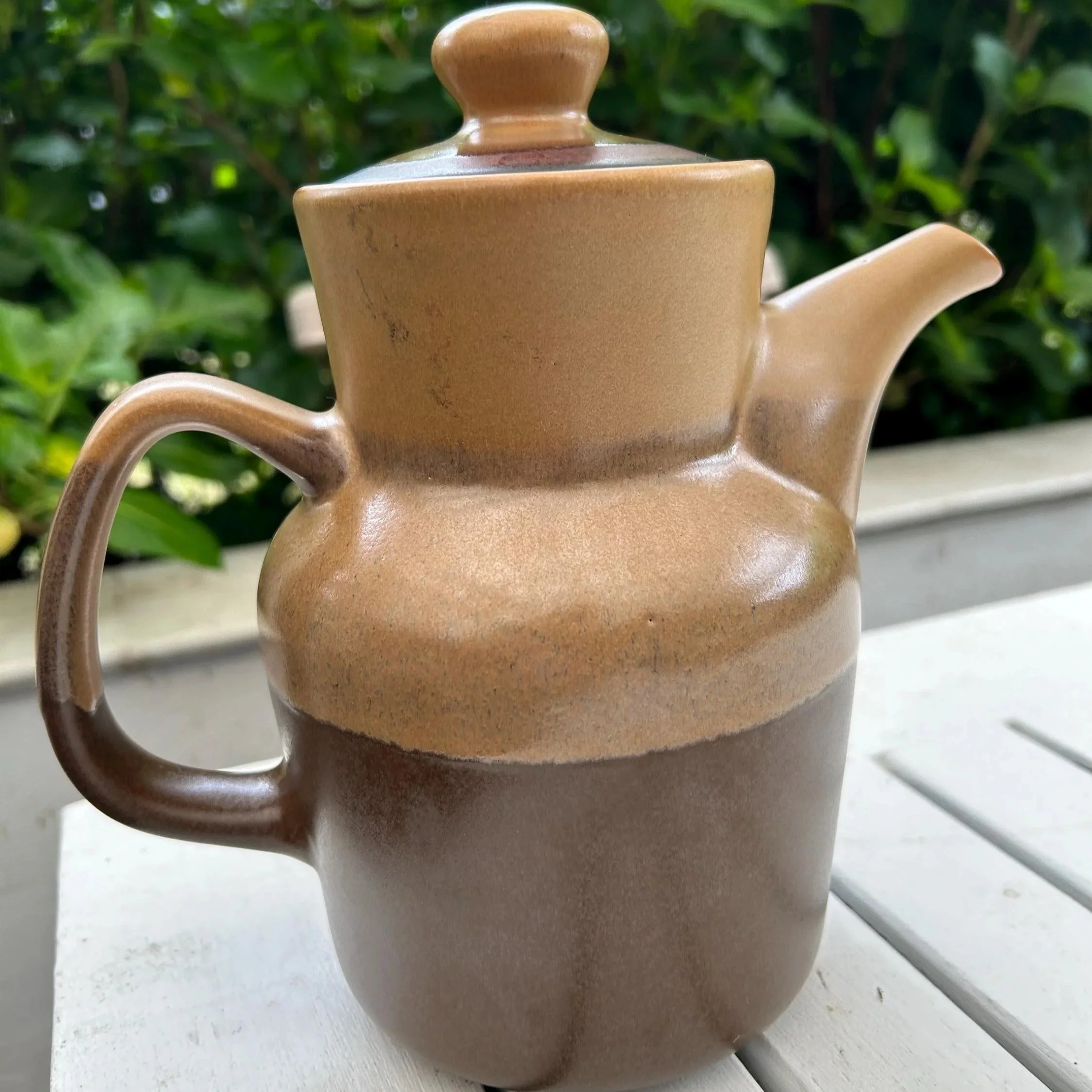 Front view of Korean vintage coffee pot showing tri-toned glaze and spout