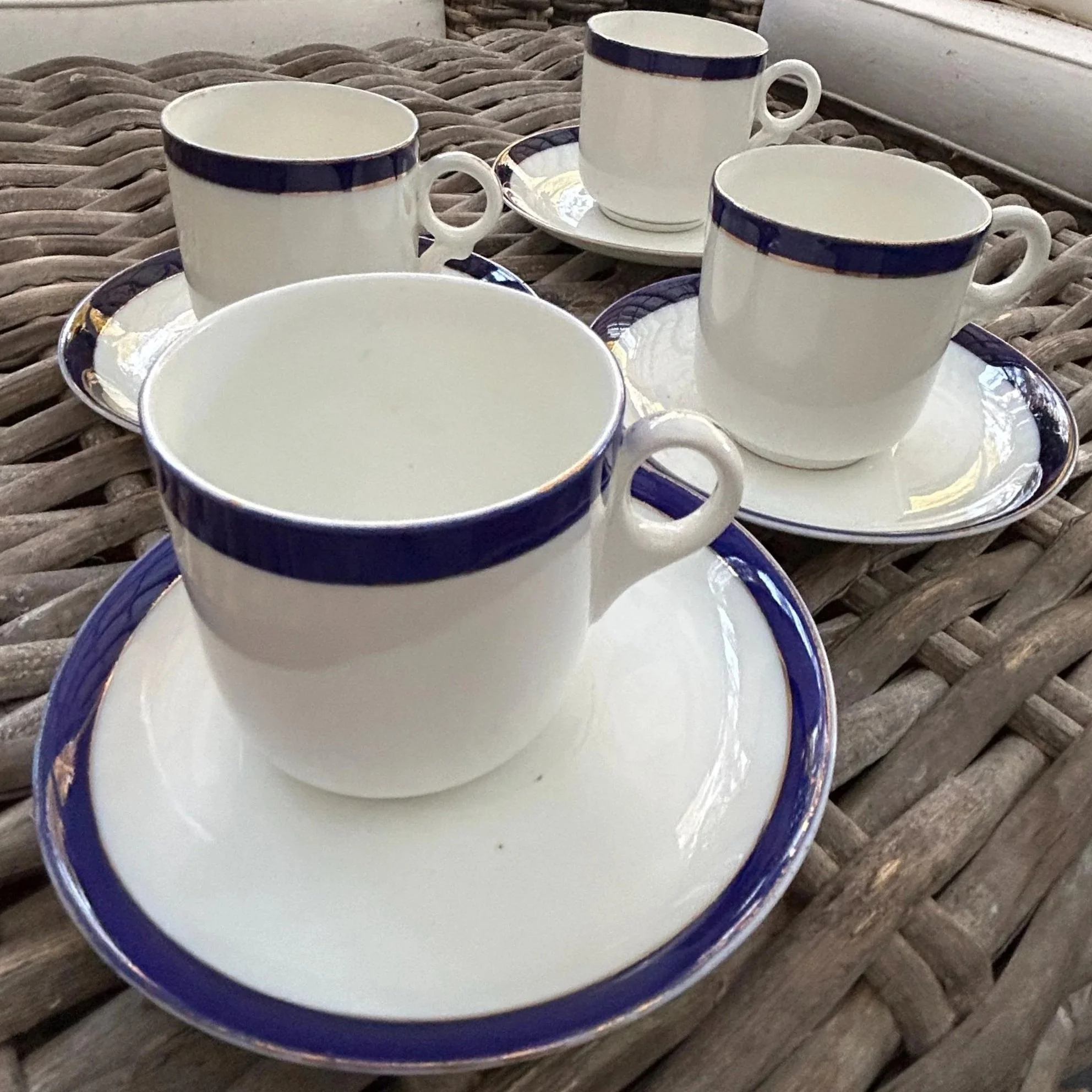 Eclectic set of 4 vintage Sutherland demitasse cups with matching saucers