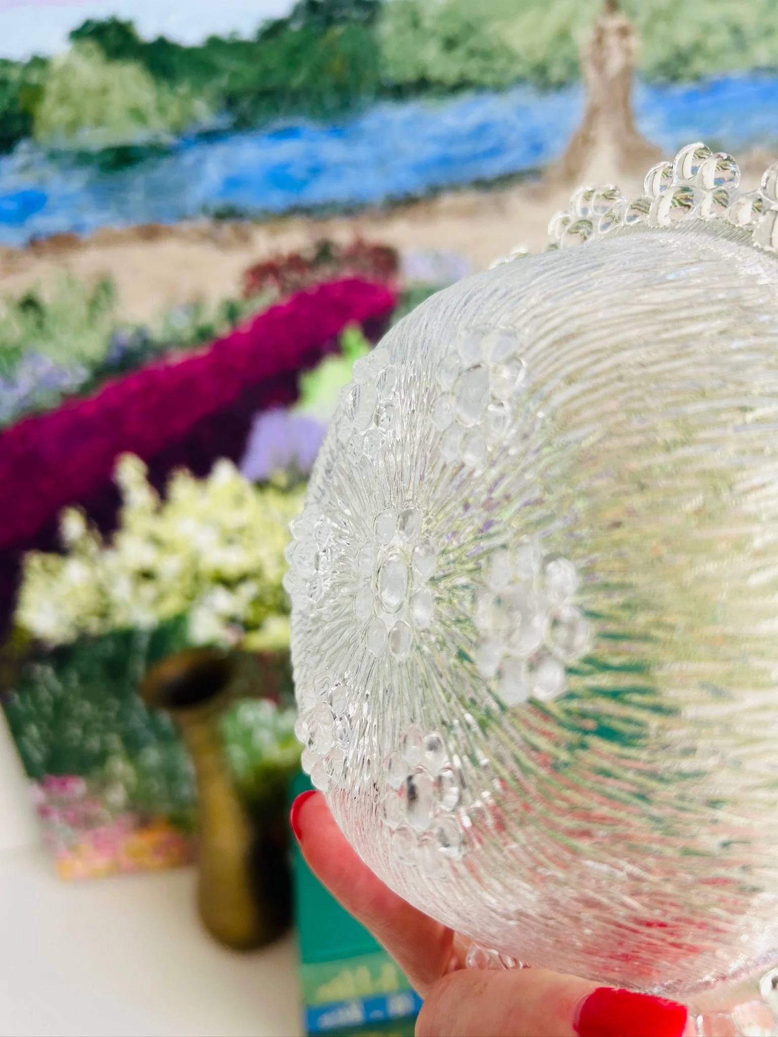 Close side view of the bowl showing the bark-effect pressed glass texture and raised bubble edge.
