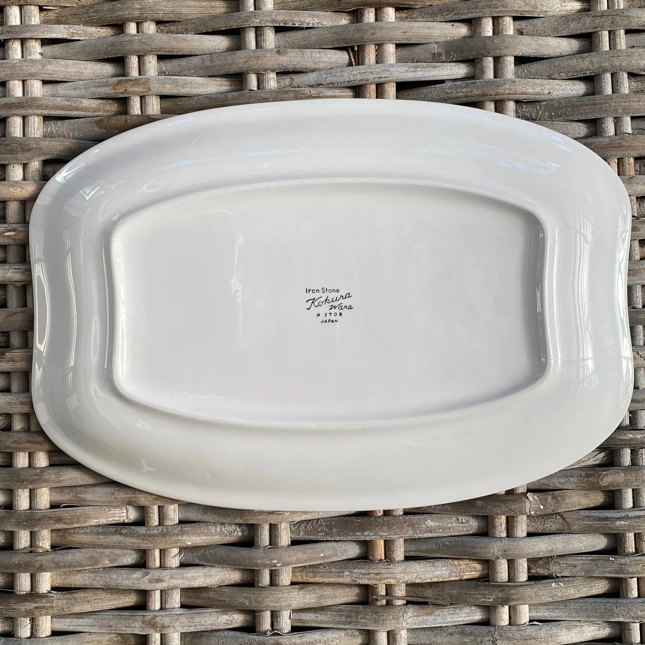 Underside of platter showing clean glaze and gently recessed base