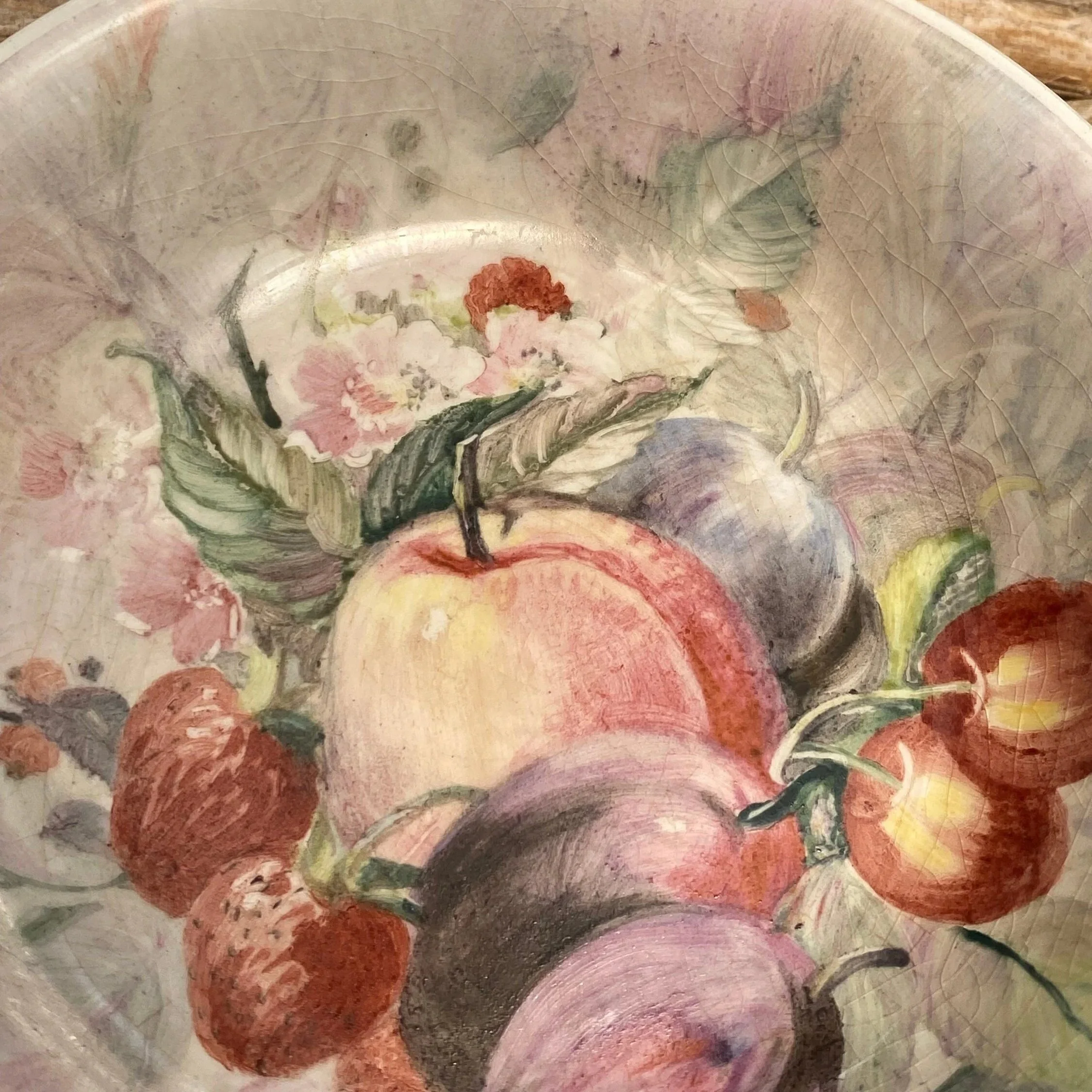 Detailed view of fruit decoration showing colour and brushwork