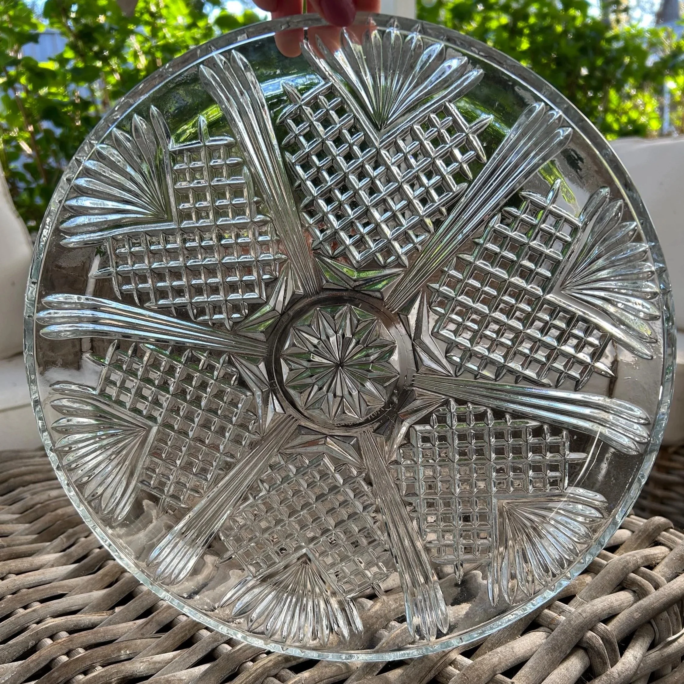 Full frontal view of platter held outdoors in natural light.