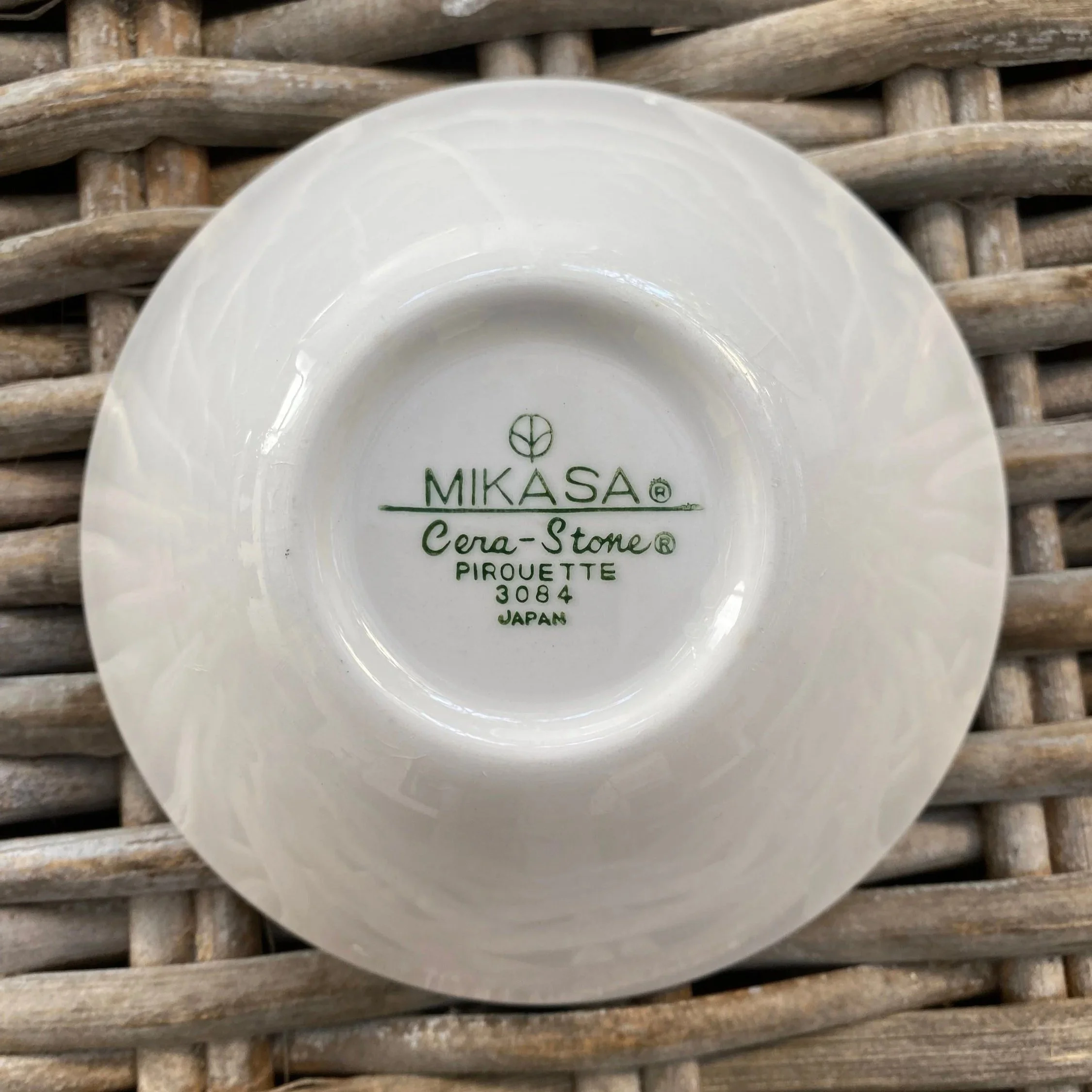 Base of bowl with “Mikasa Cera-Stone Pirouette 3084 Japan” stamp