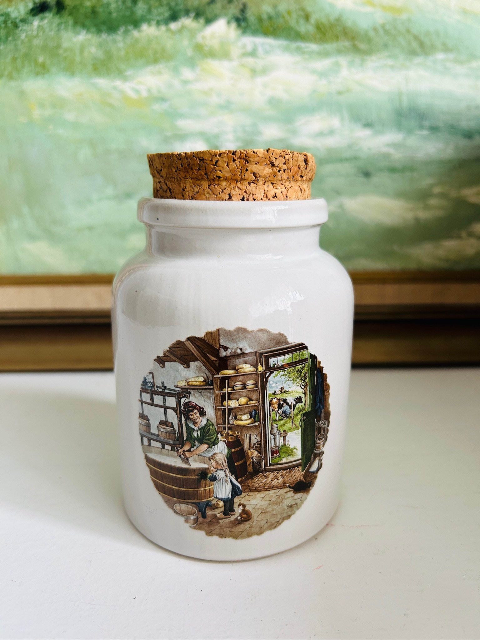 Single Dutch ceramic pot with cork stopper, featuring the hand-painted cheese shop village scene on the front.