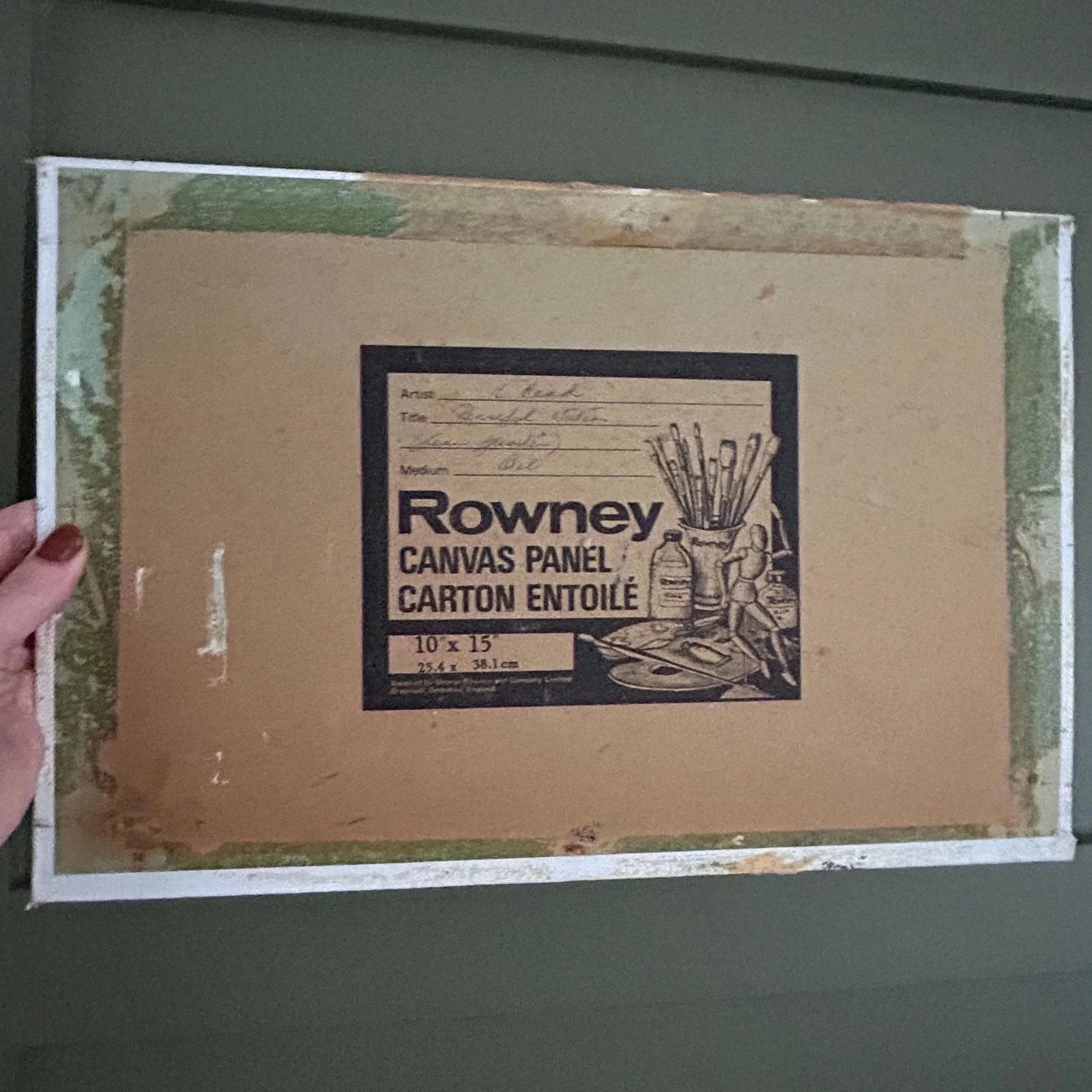 Reverse of canvas panel showing Rowney branding and taped edges