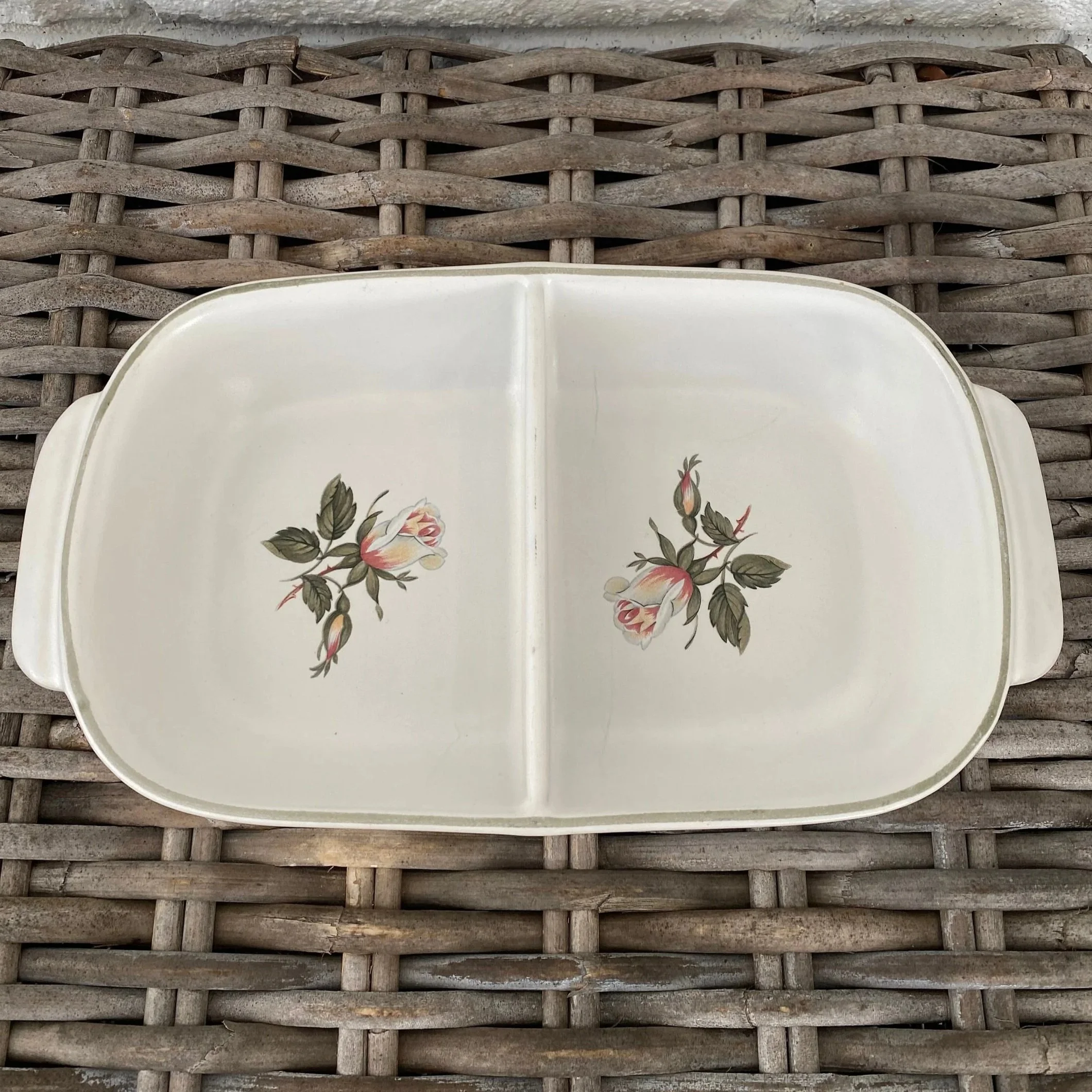Denby divided vegetable dish with rose pattern, overhead view