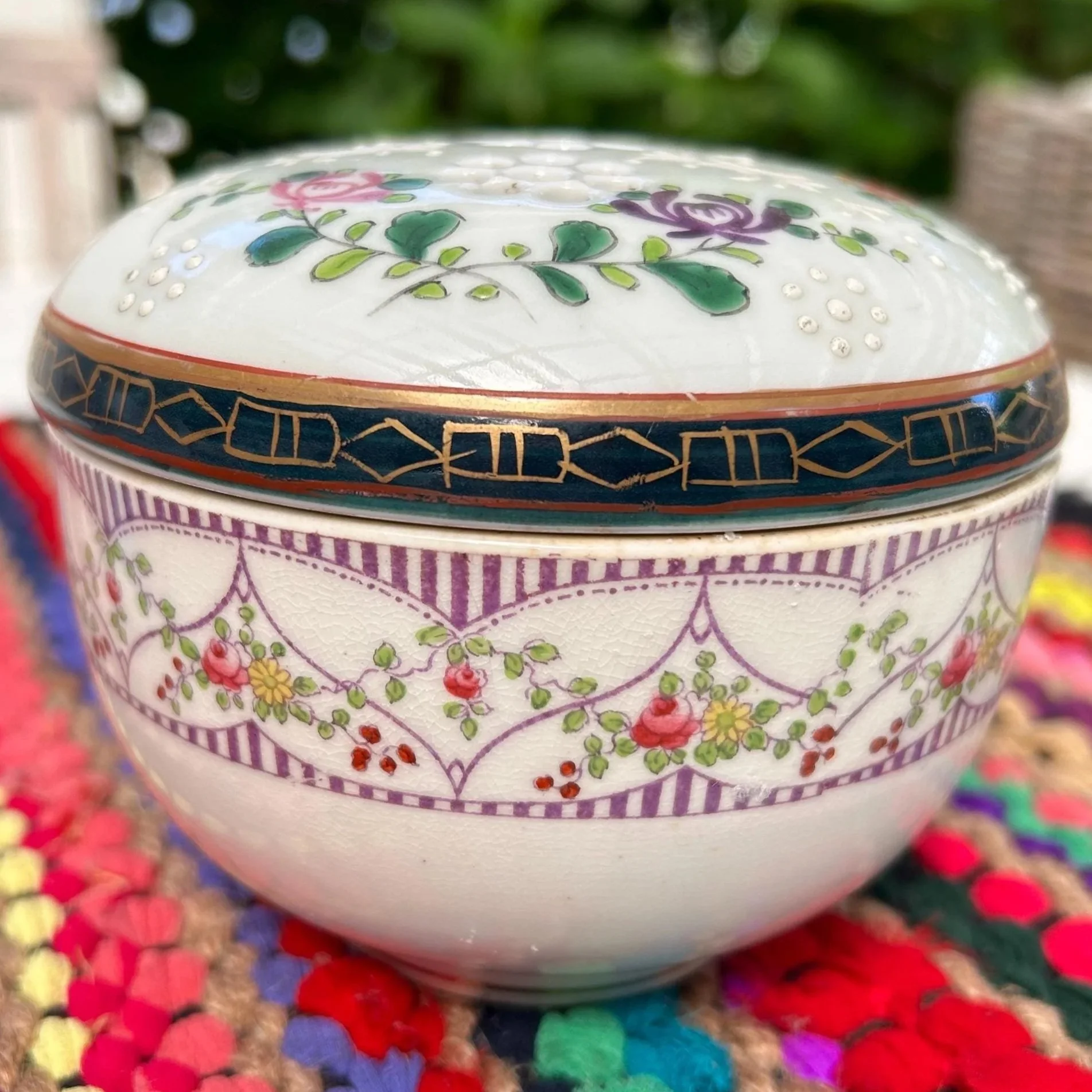 Crown Staffordshire flower frog bowl with lid on, showing floral and gold design