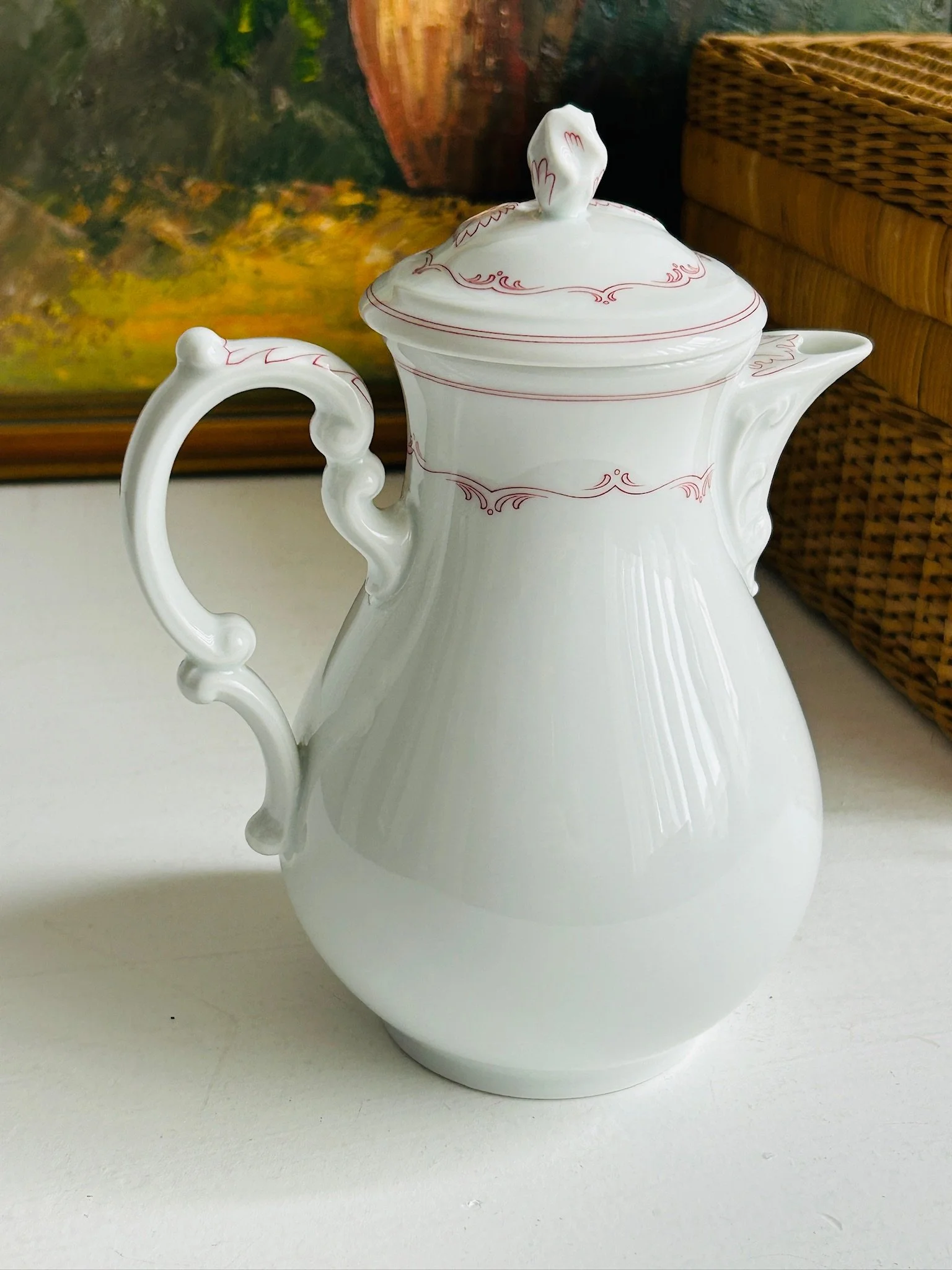 Full side view of the Hutschenreuther Maria Theresia Mainau coffee pot, showing the complete profile with ornate handle and pointed spout.