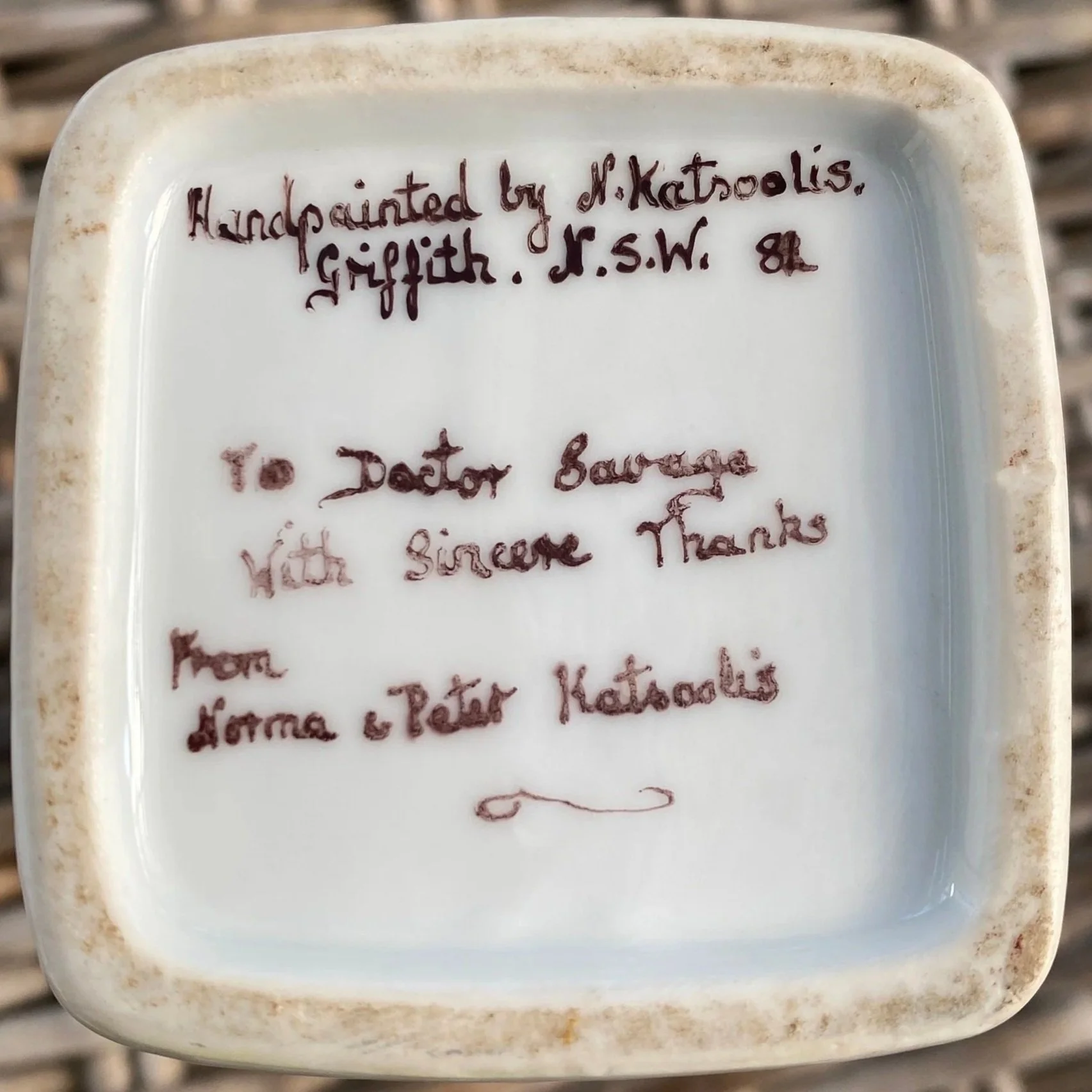 Underside inscription: “Handpainted by N. Katsoulis, Griffith, N.S.W. 81 – To Doctor Savage With Sincere Thanks From Norma & Peter Katsoulis”