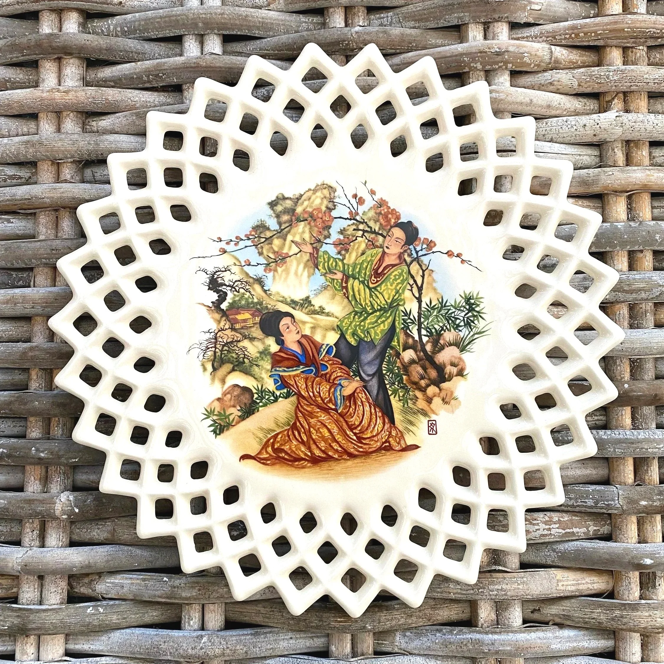 Overhead view of full collector plate showing Japanese scene and lattice rim