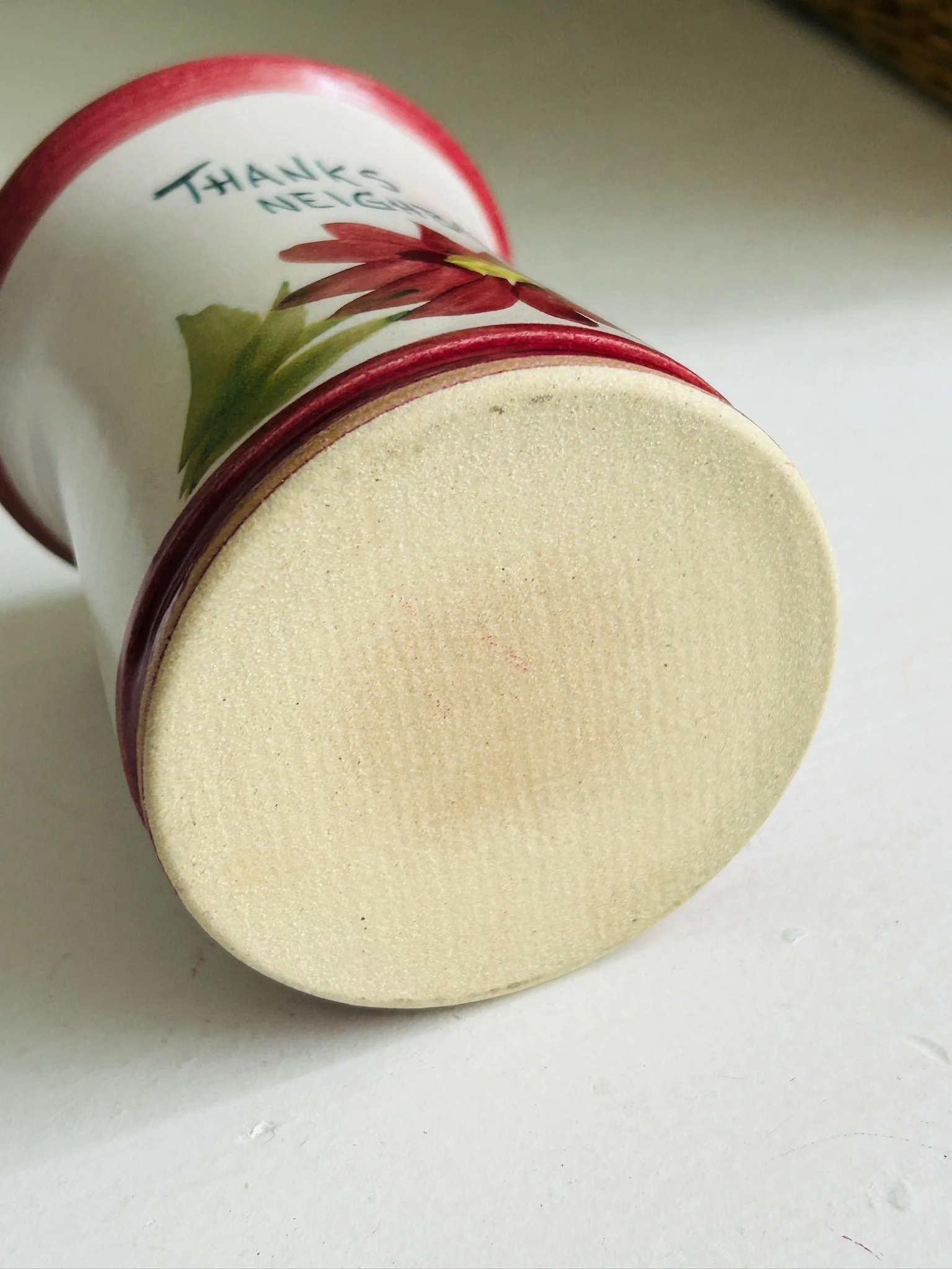 Base of the ceramic vase shown from underneath, revealing an unmarked underside