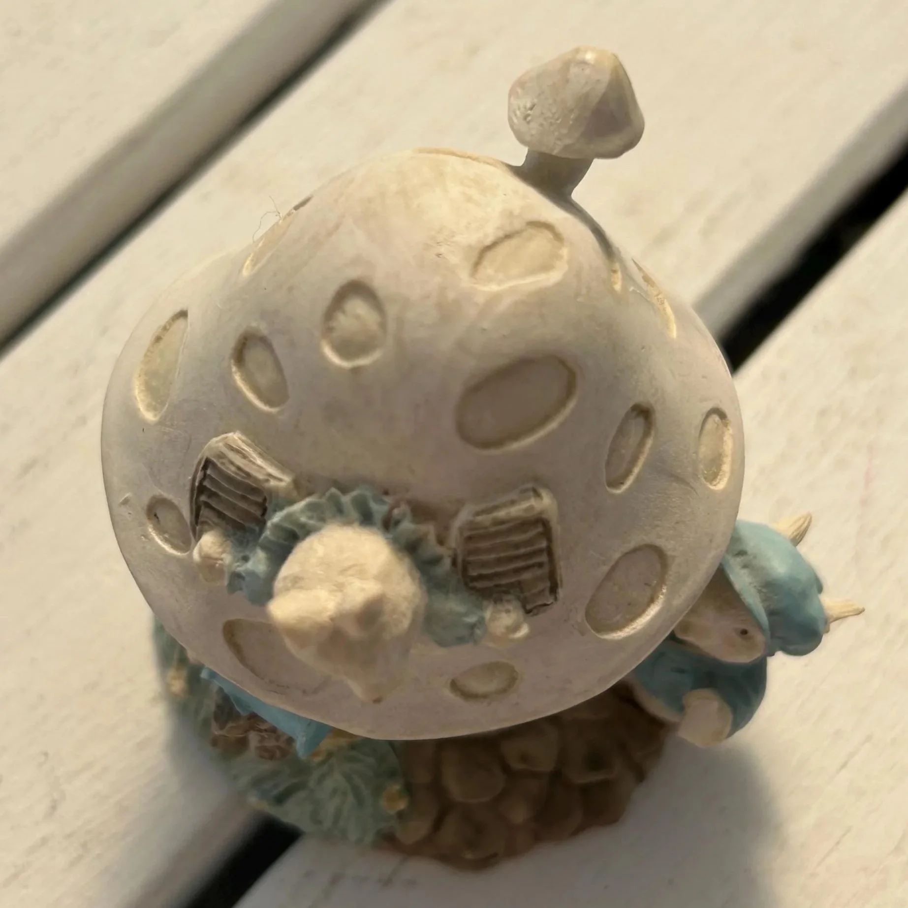 Overhead view of roof with mushroom spots and chimney