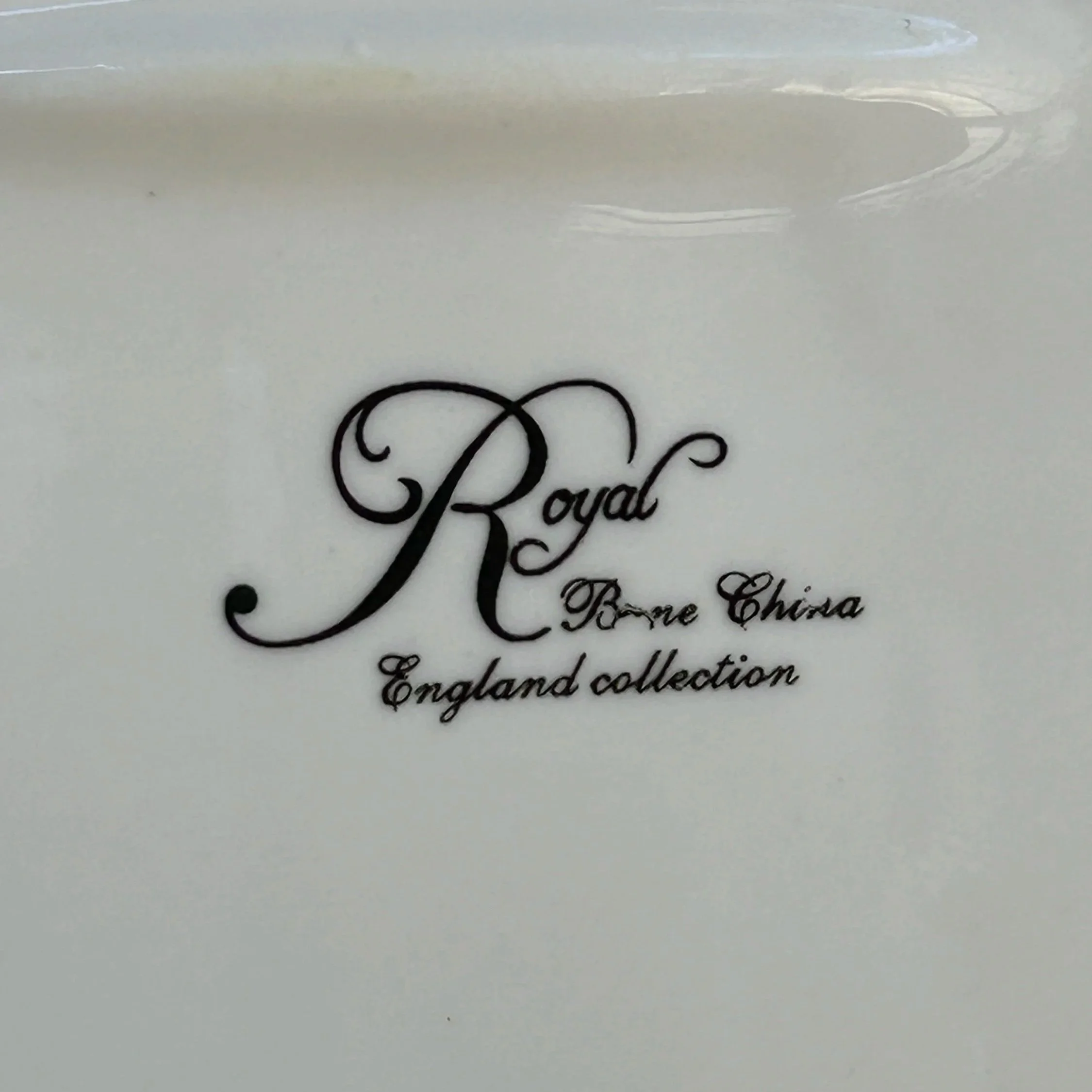 Close-up of backstamp reading “Royal Bone China England Collection”