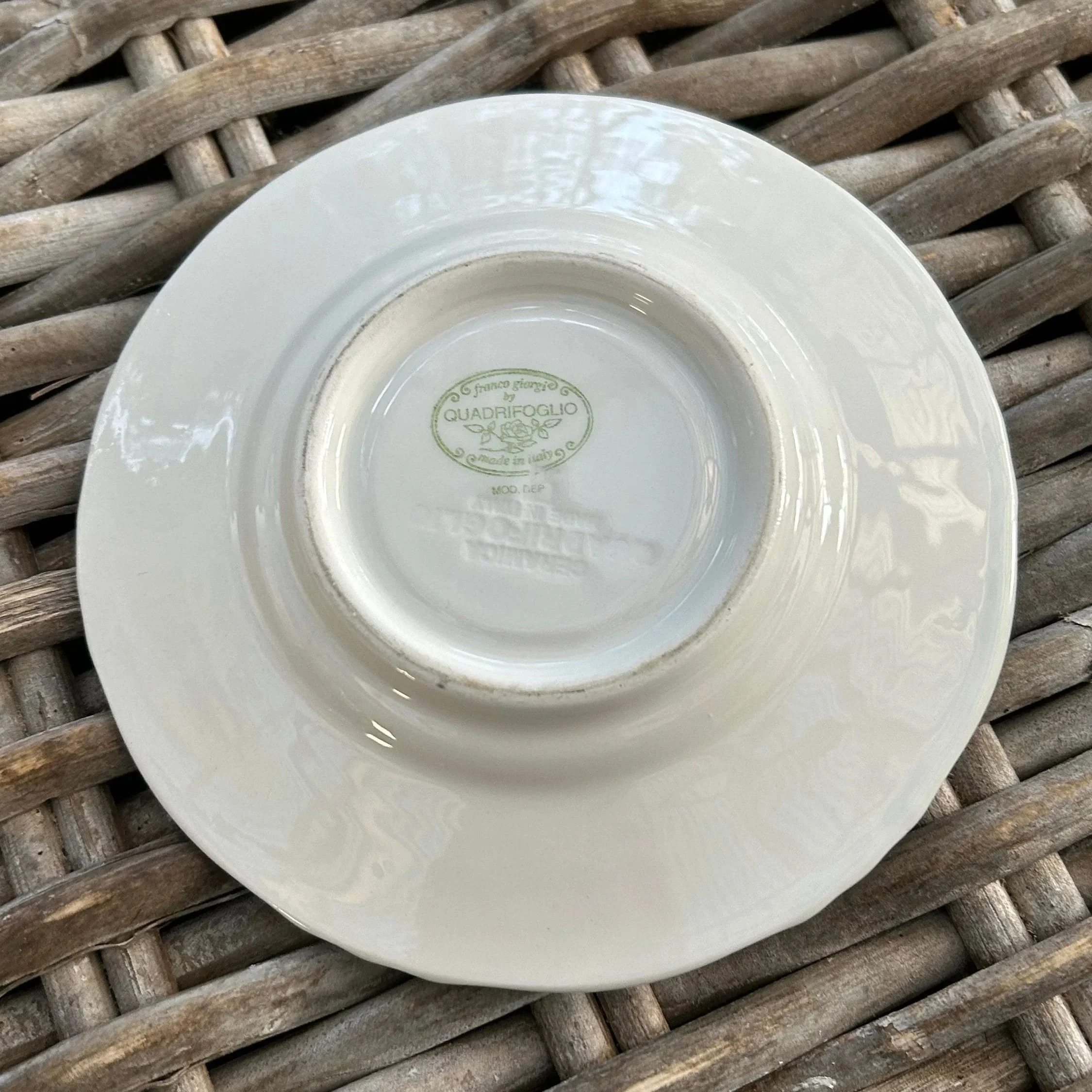 Underside of saucer with Franco Giorgi Quadrifoglio maker’s mark