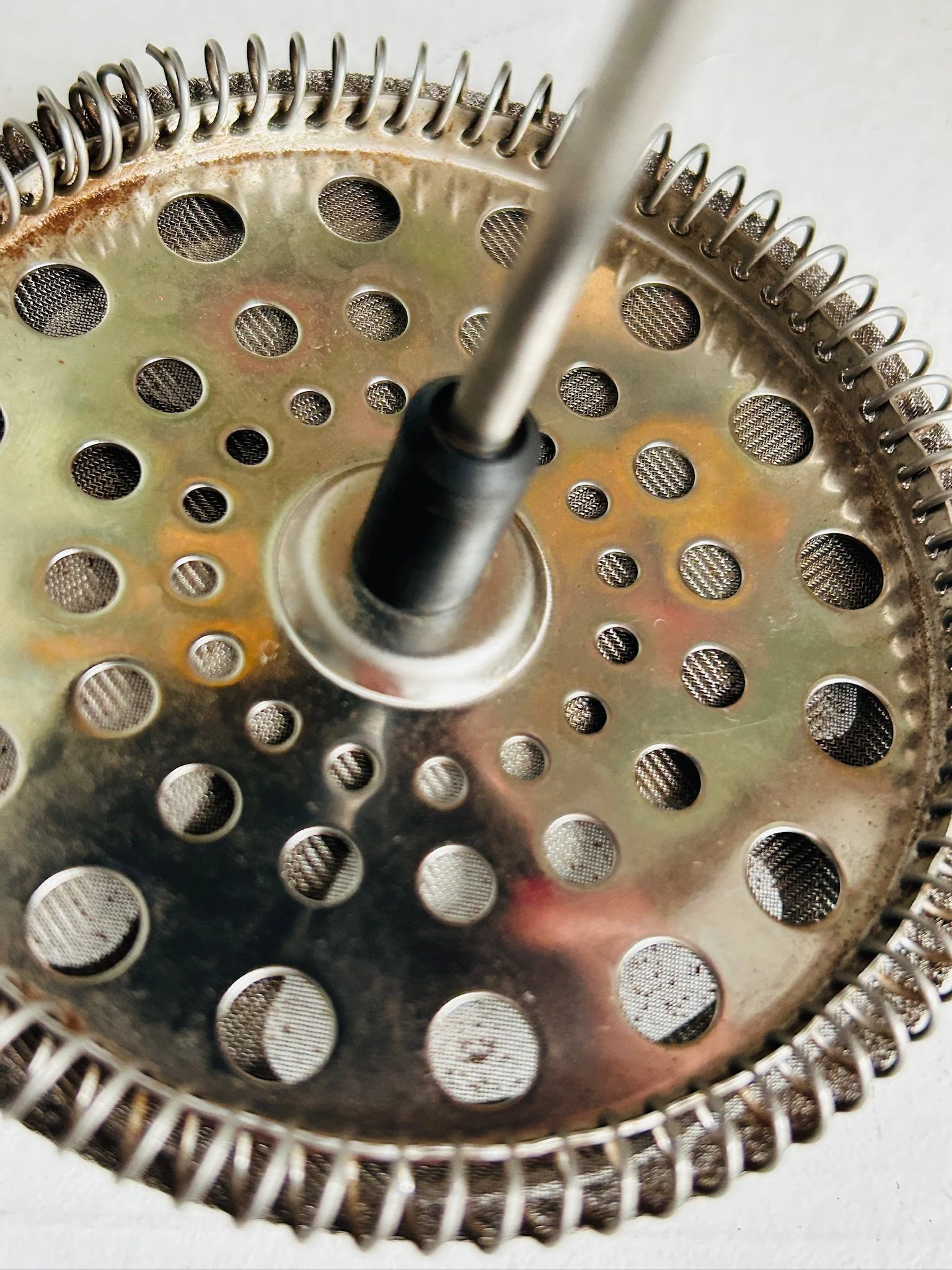 Close-up of the black lid and pouring spout area, showing the matte finish and simple Scandinavian design.
