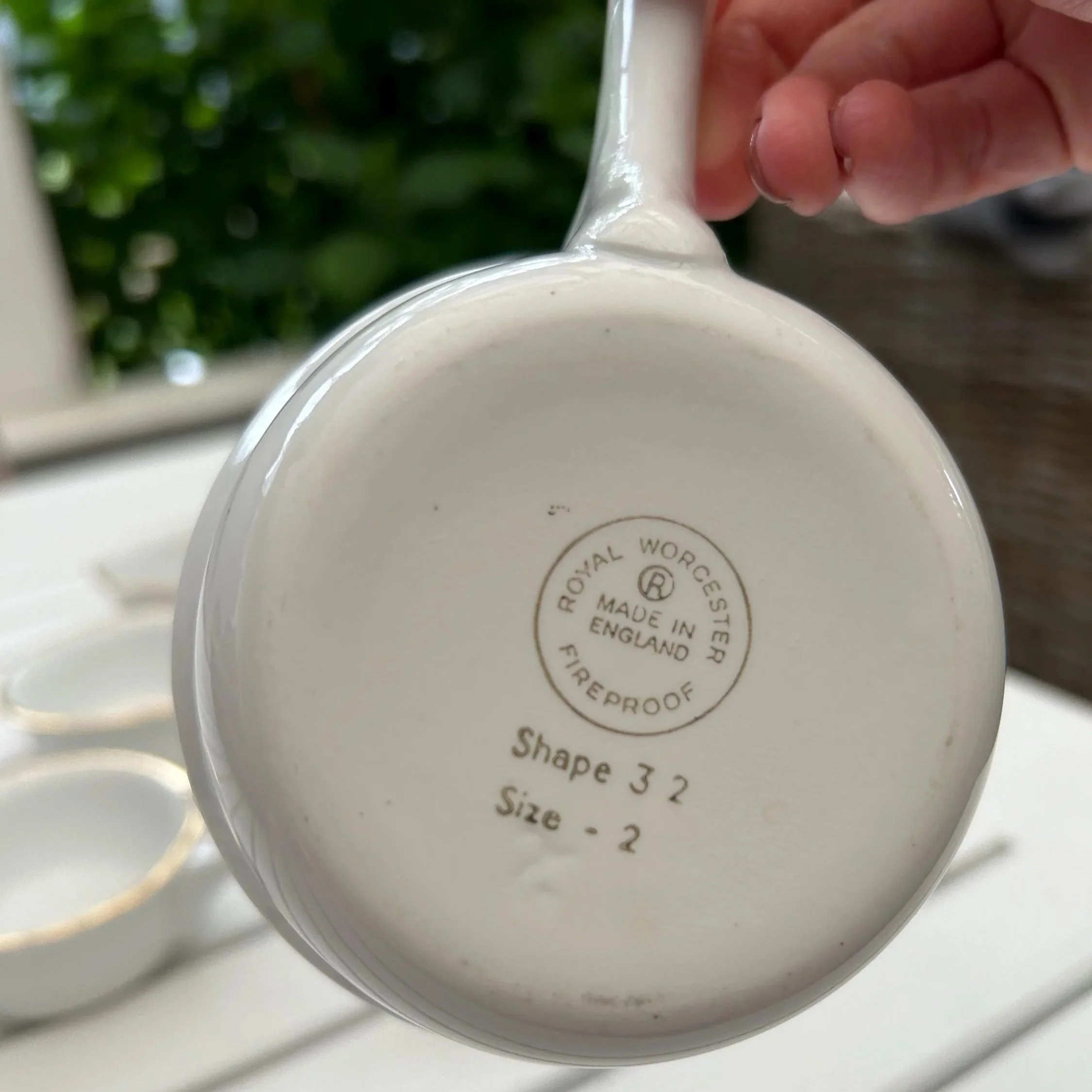Underside of ramekin with Royal Worcester backstamp and shape/size marking