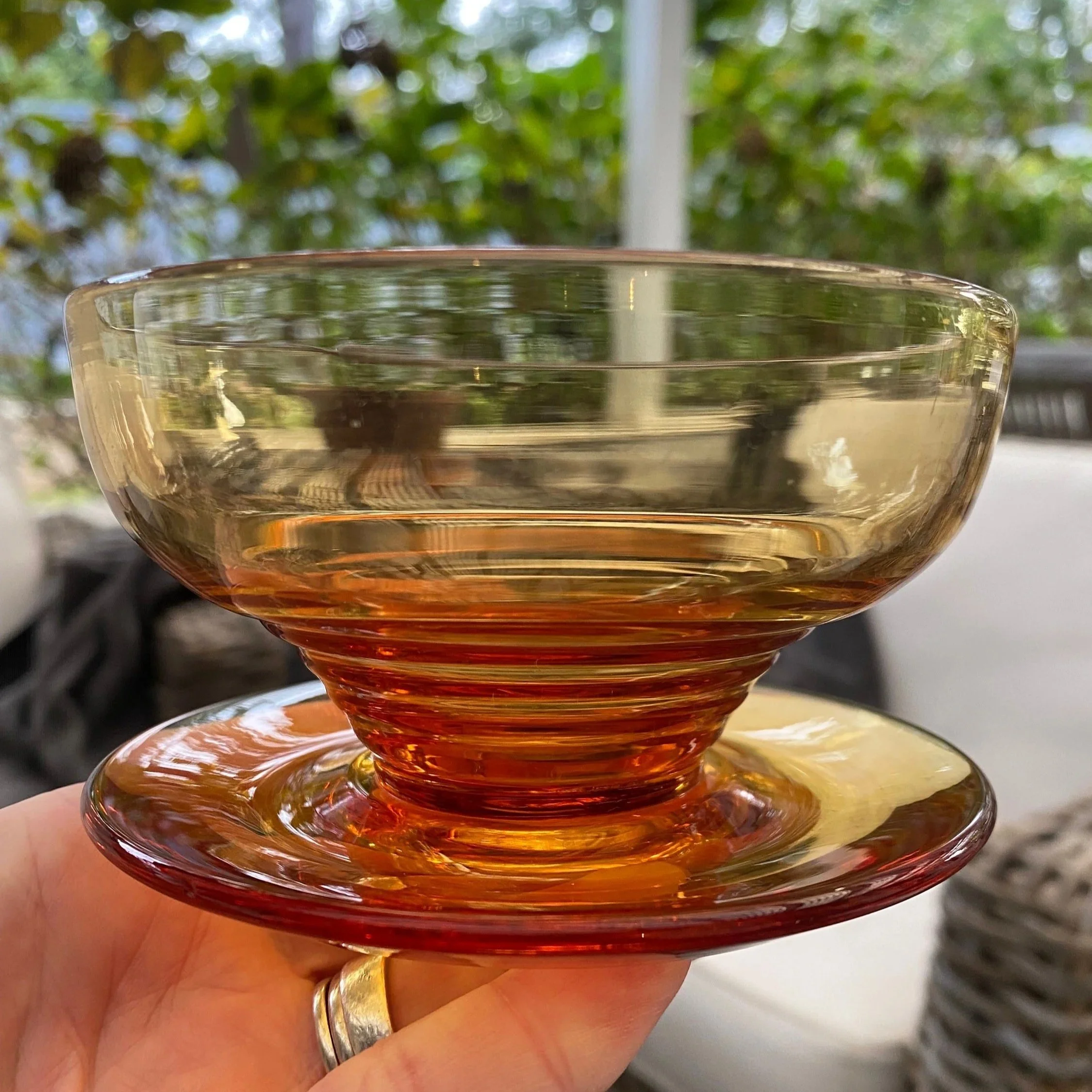 Close-up of bowl showing amber colour and elegant Art Deco lines