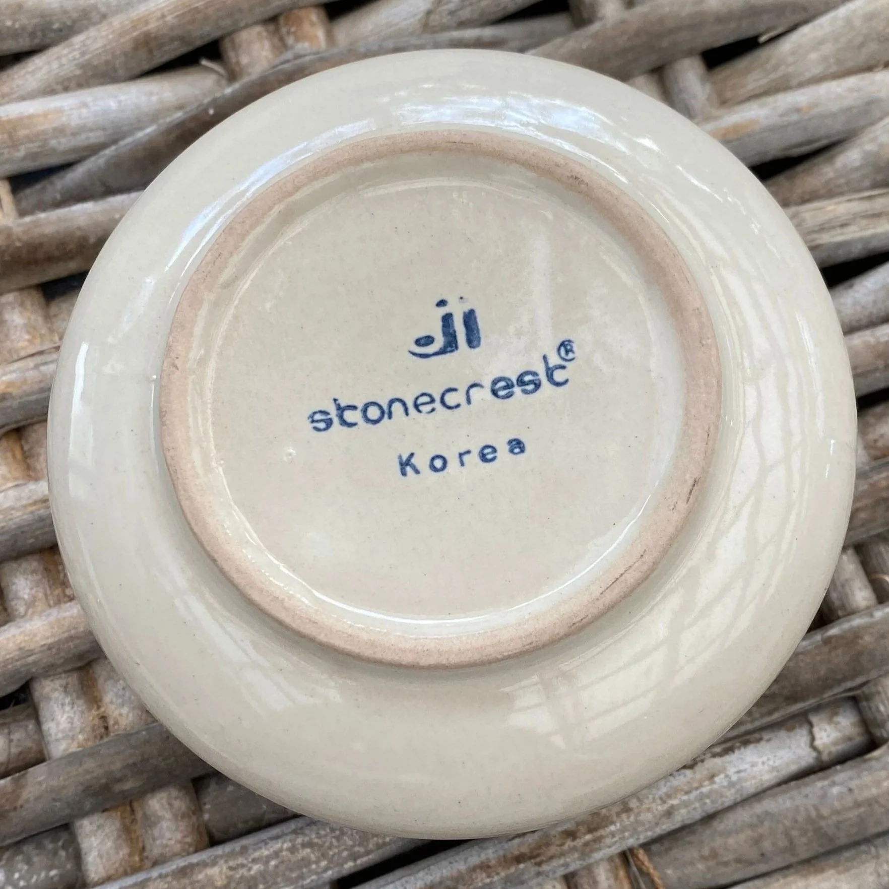Base of ceramic bowl showing J I Stonecrest Korea maker’s mark