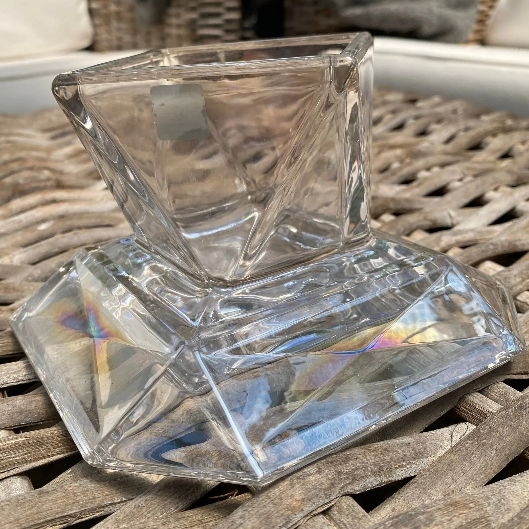Side view of the reversible PartyLite candle holder showing iridescent crystal detail and angled design