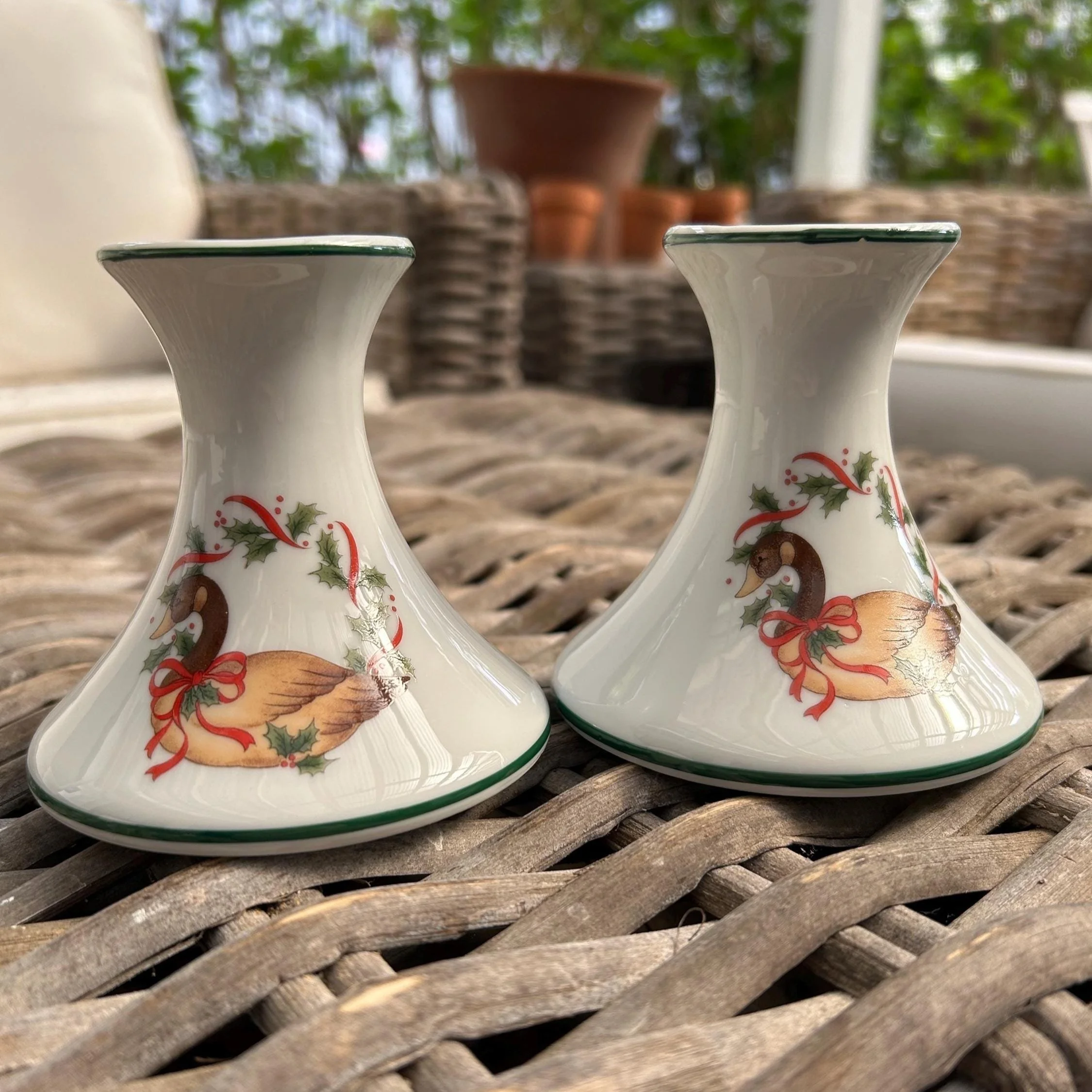 Set of 2 vintage taper candlesticks with ducks, holly, and festive ribbon design. Made in Japan, perfect for Christmascore or traditional holiday decor.