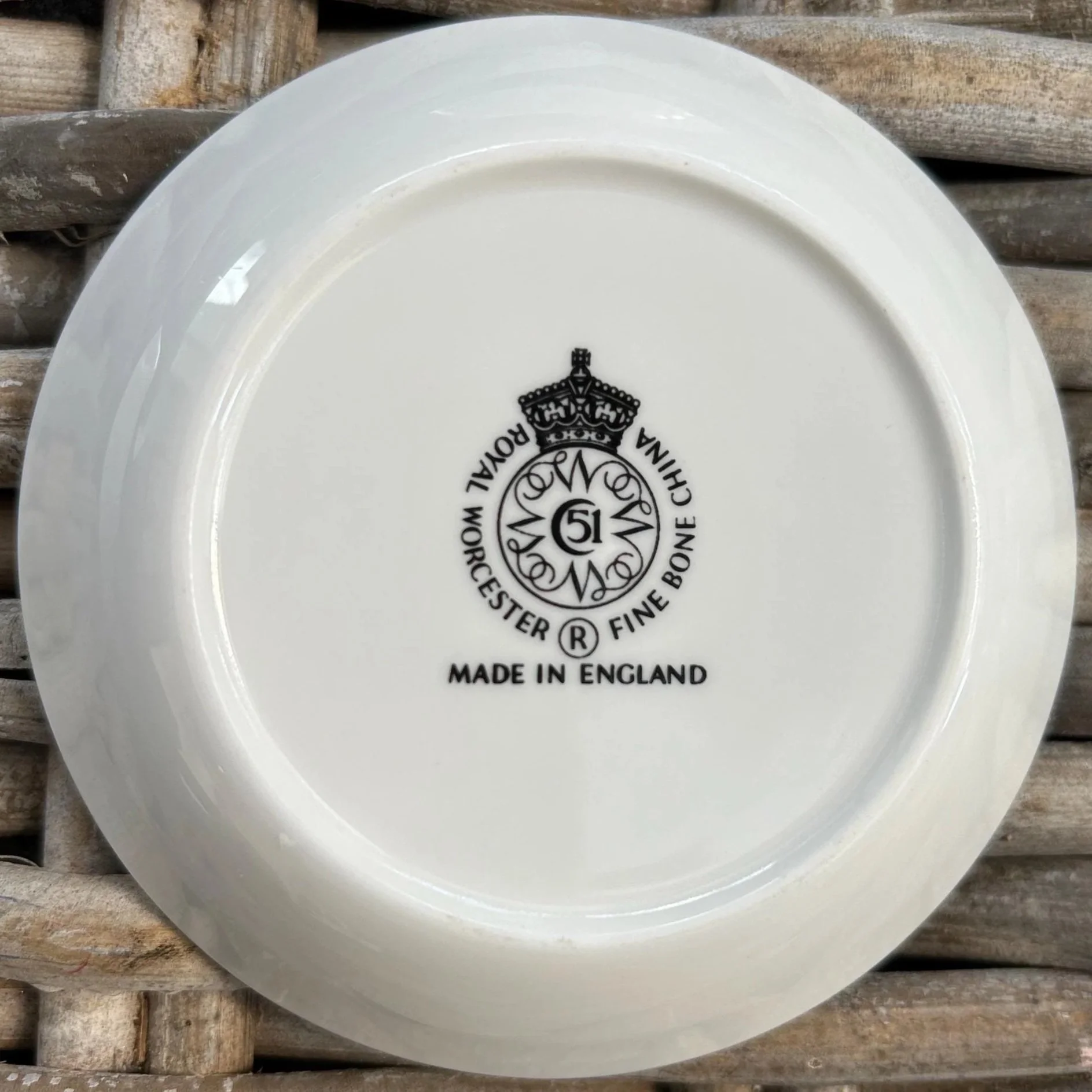 Underside view of yellow dish showing Royal Worcester hallmark