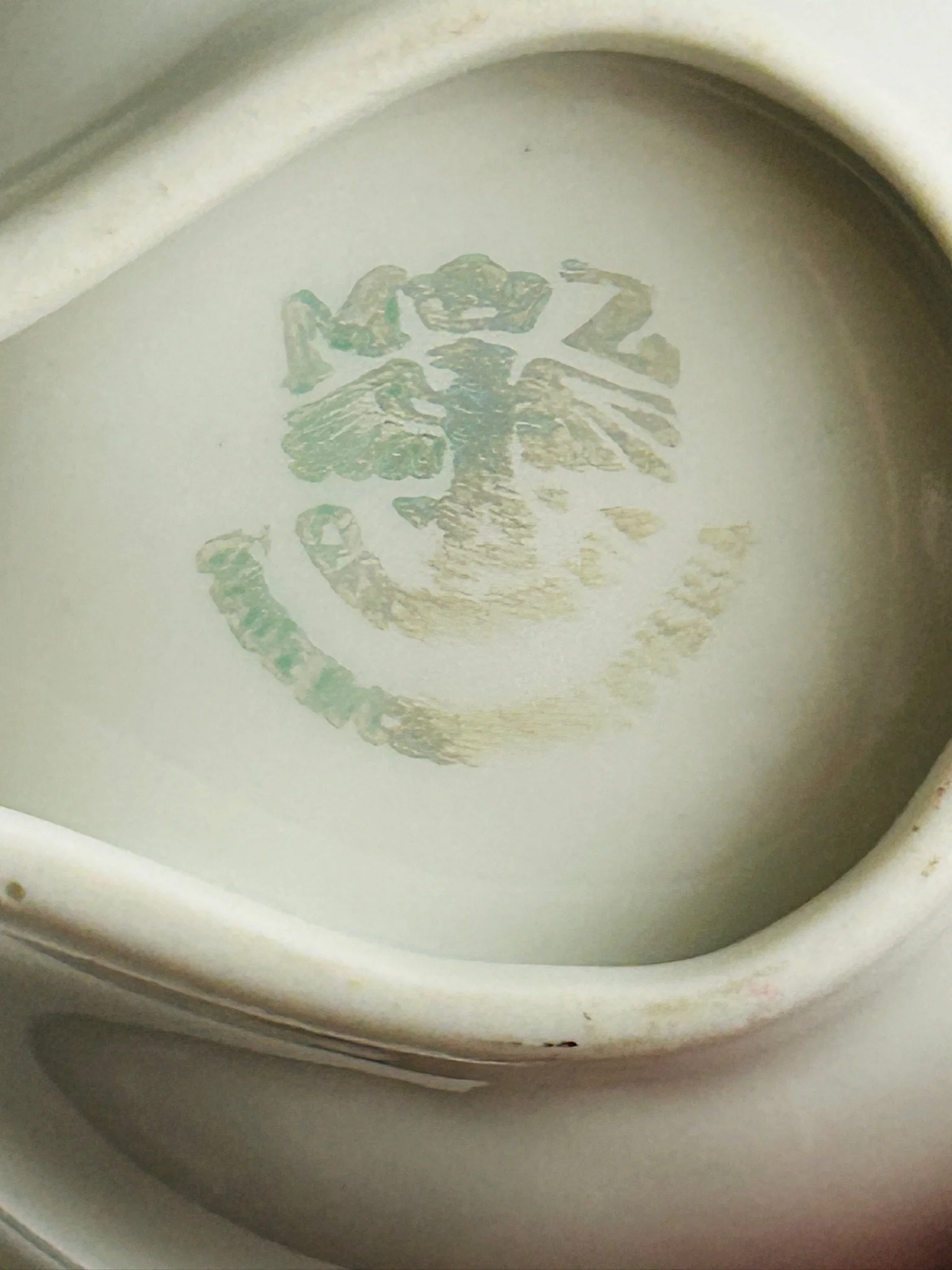 Close-up of the base interior showing the faded MZ Czechoslovakia maker’s mark