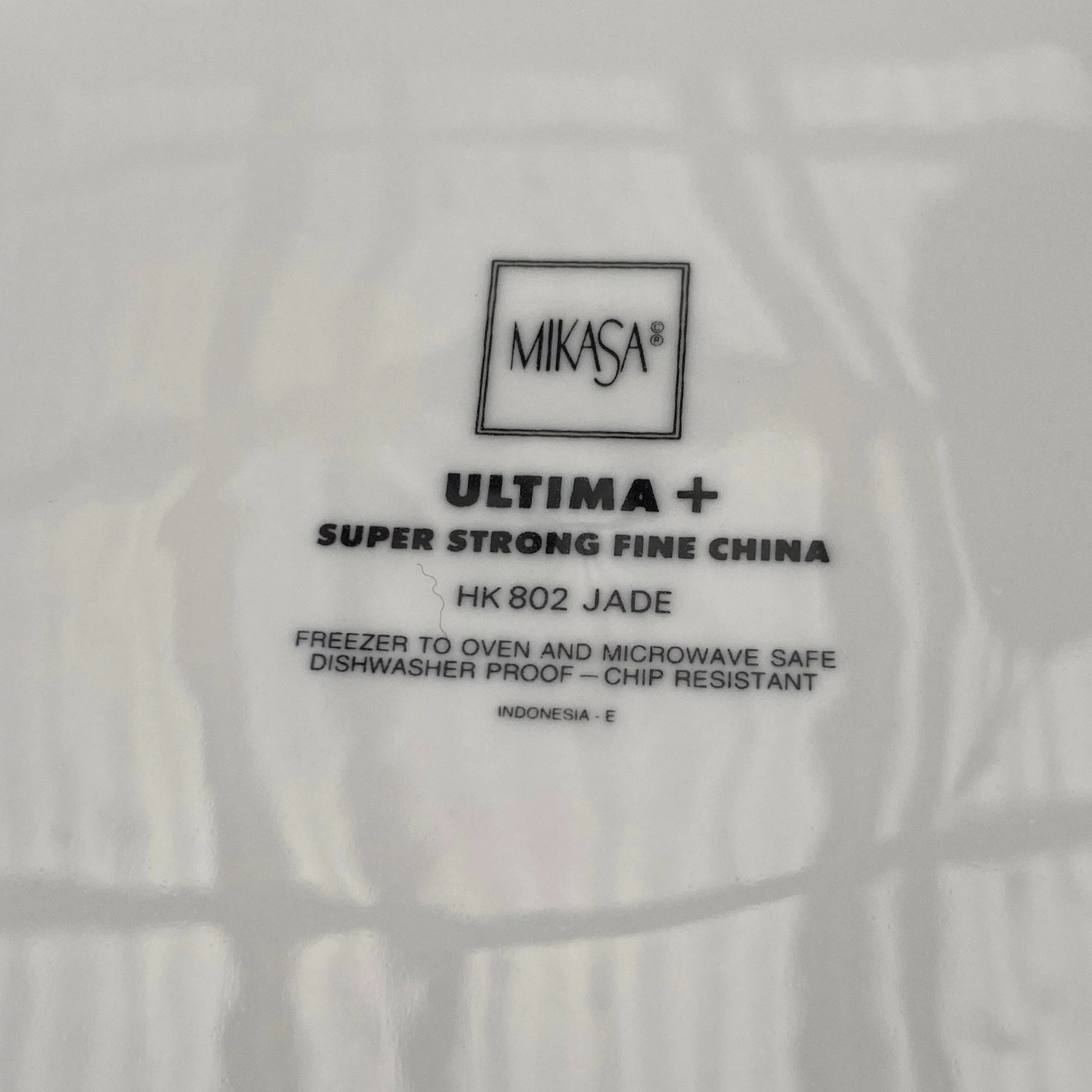 Maker’s mark showing Ultima+ branding and usage instructions