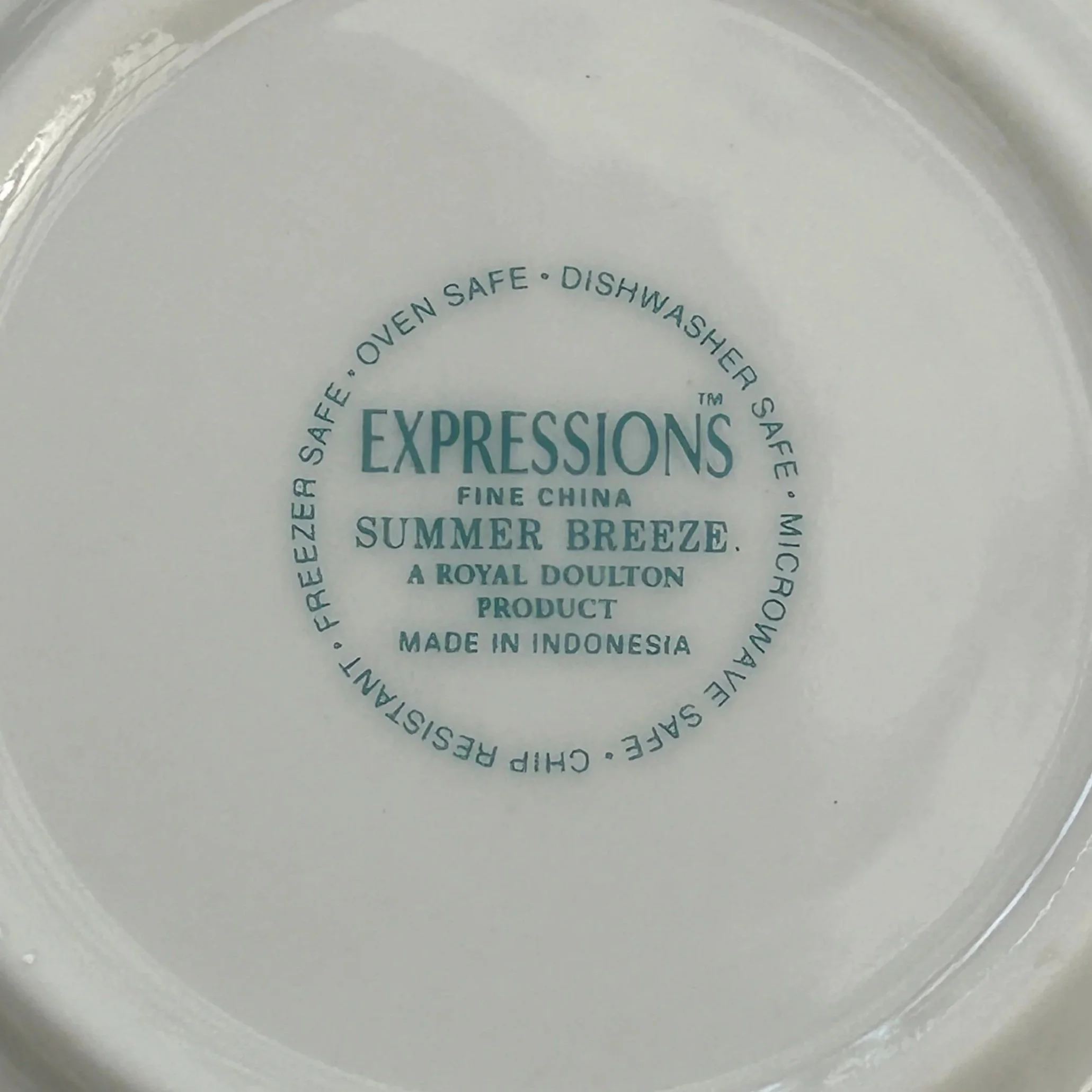 Underside close-up showing “Summer Breeze” Expressions backstamp
