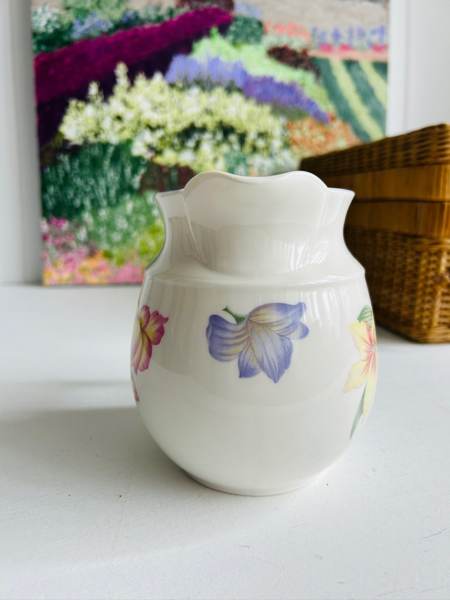 Rear side view highlighting the handle and floral motif