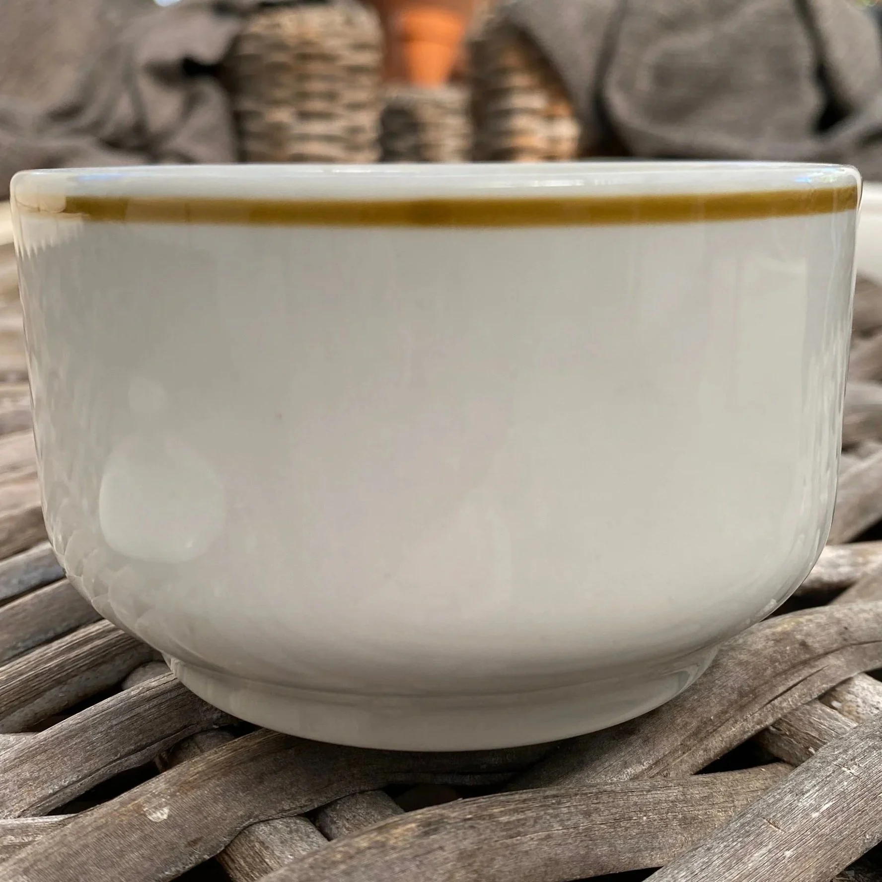 Close-up of brown rim and bowl body