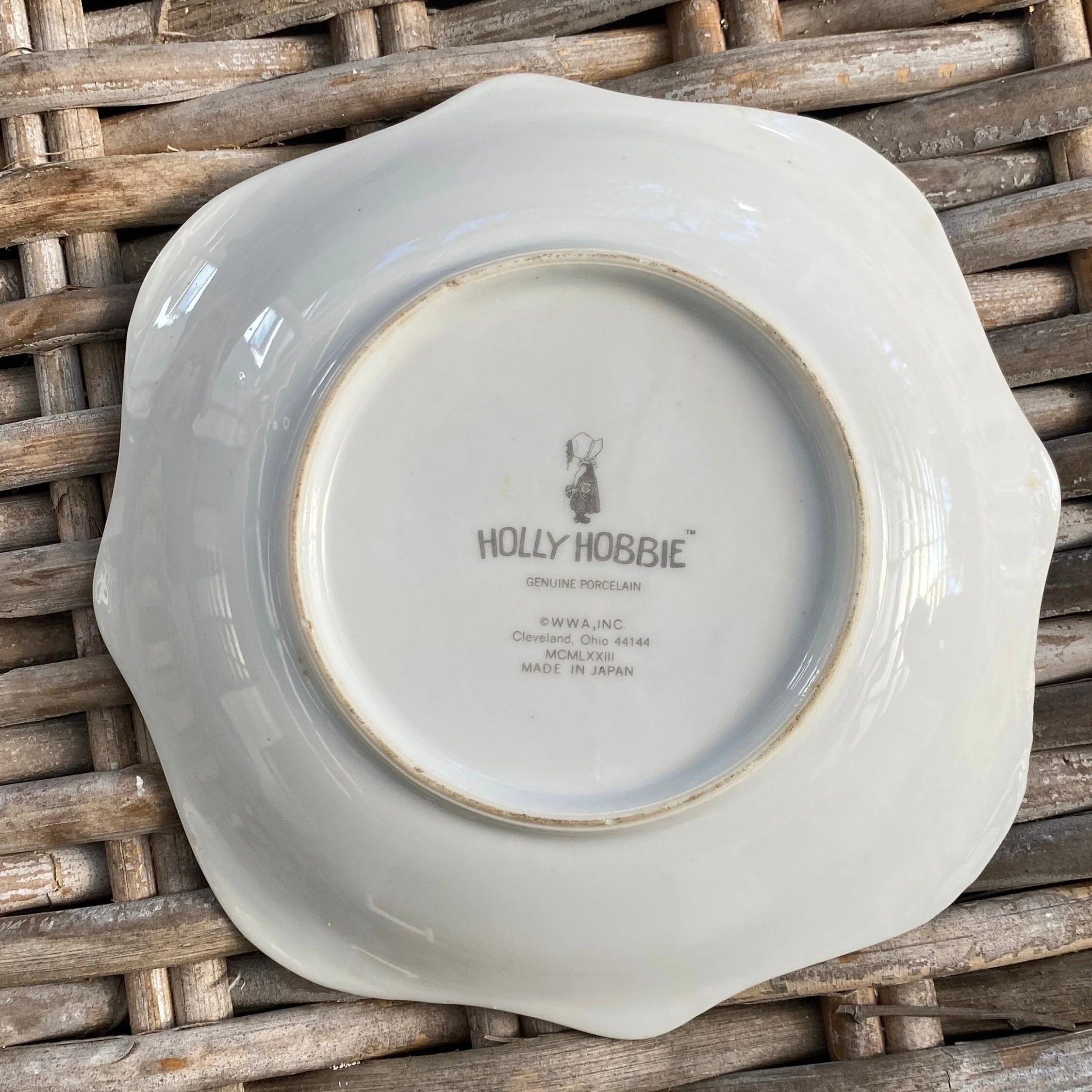 Back of vintage Holly Hobbie porcelain dish showing 1973 backstamp with ‘Made in Japan’ and ‘WWA Inc.’ mark