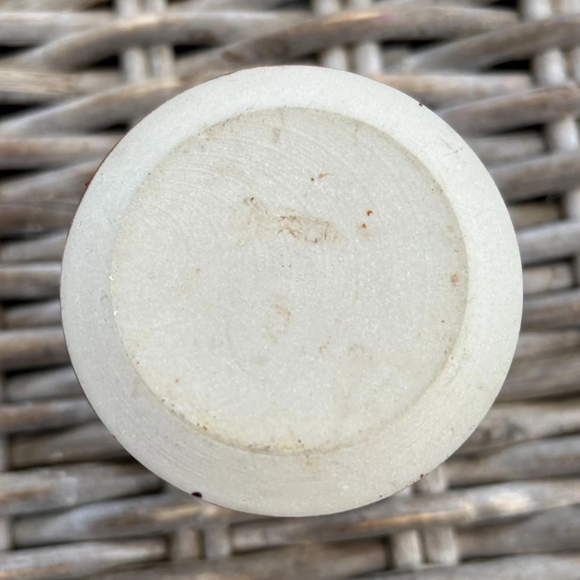 ase of jar showing unmarked stoneware underside