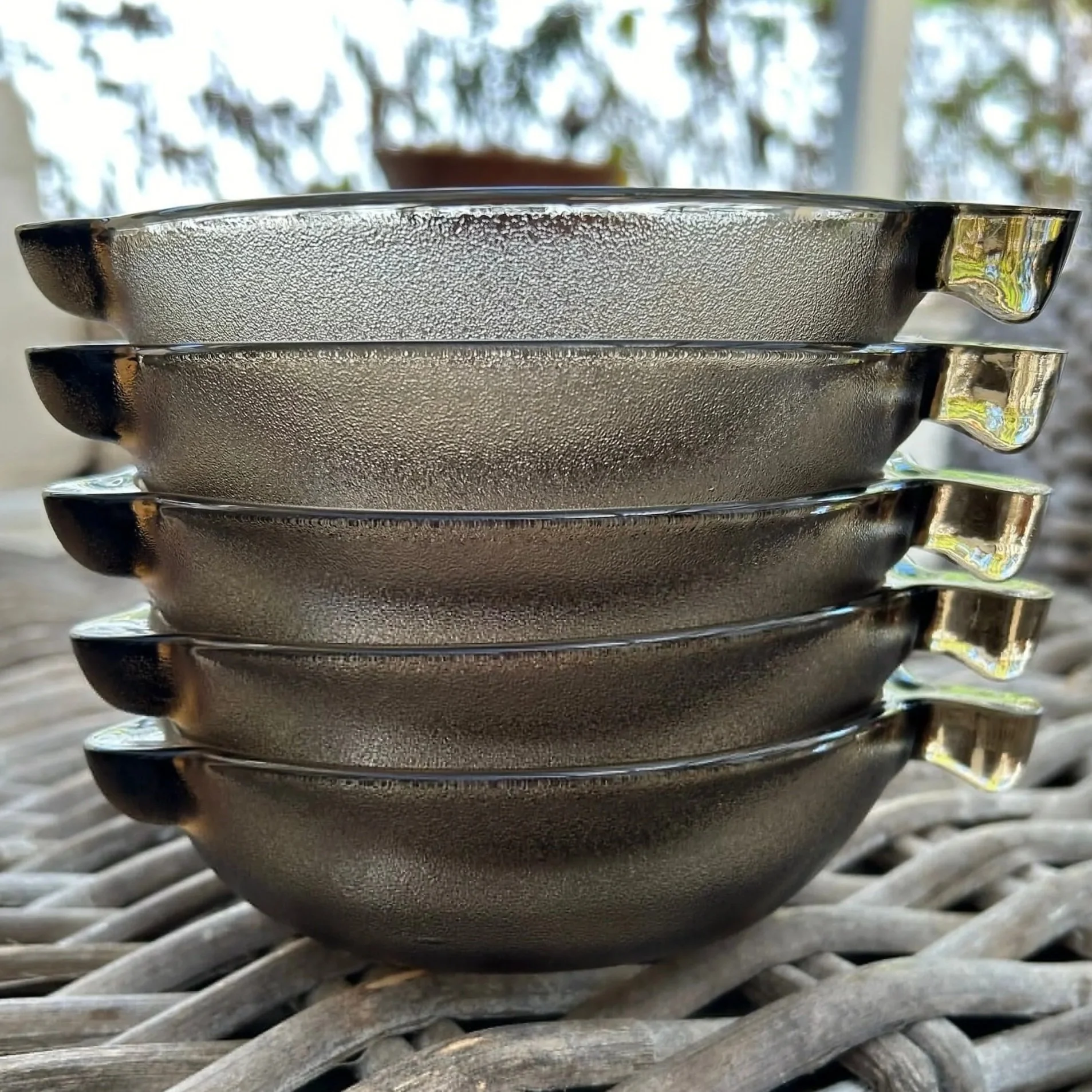 Stacked side view of the 5 bowls showing handles aligned