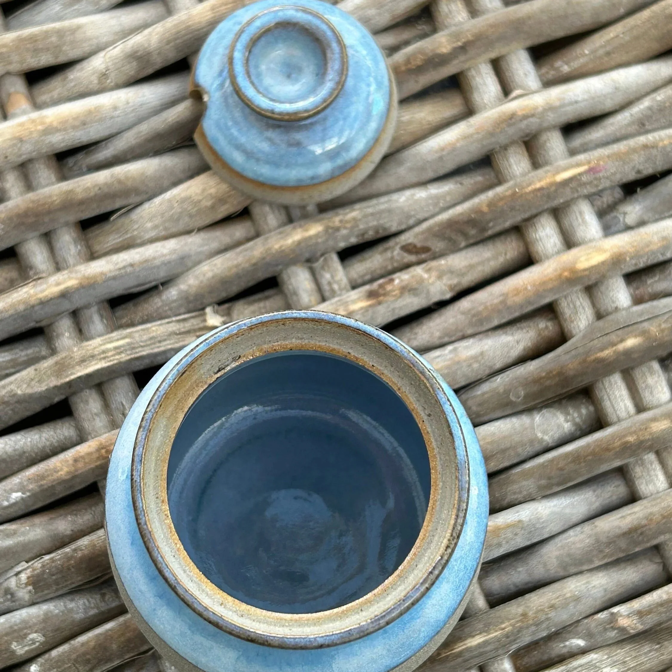 Overhead view of pot and lid, clearly showing blue glazed interior