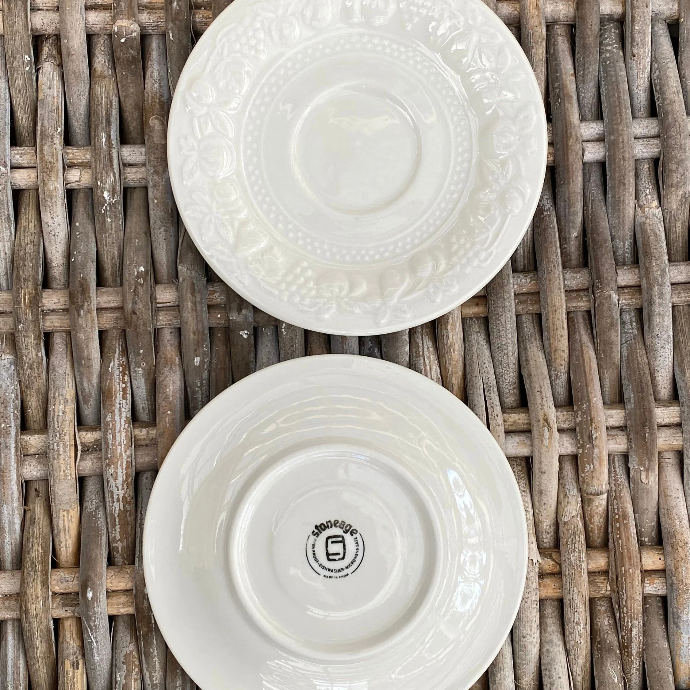 Top view of both saucers showing front and back stamp detail