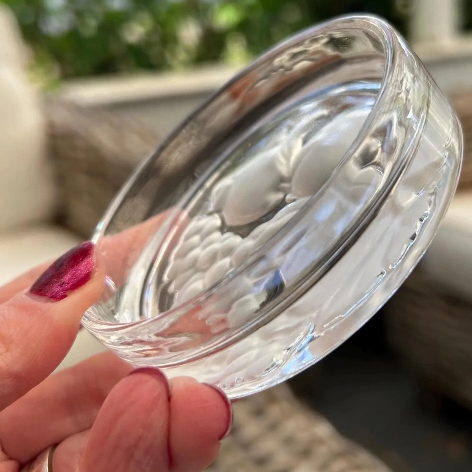 Detail of rim showing small chip on one coaster