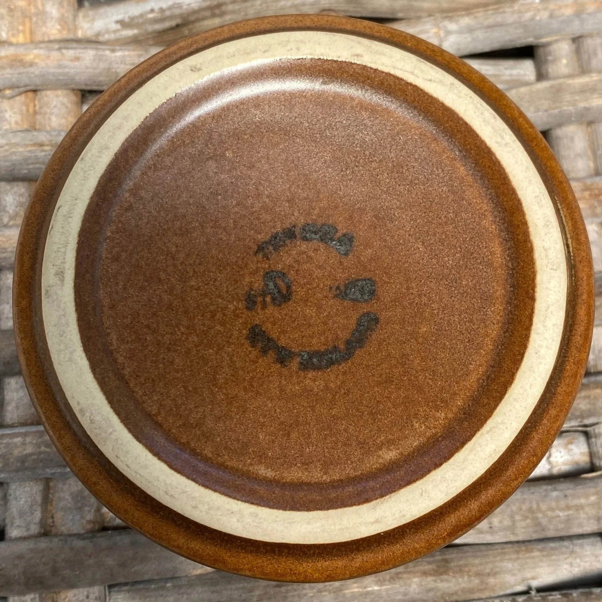 Underside with vintage maker’s stamp and unglazed ring