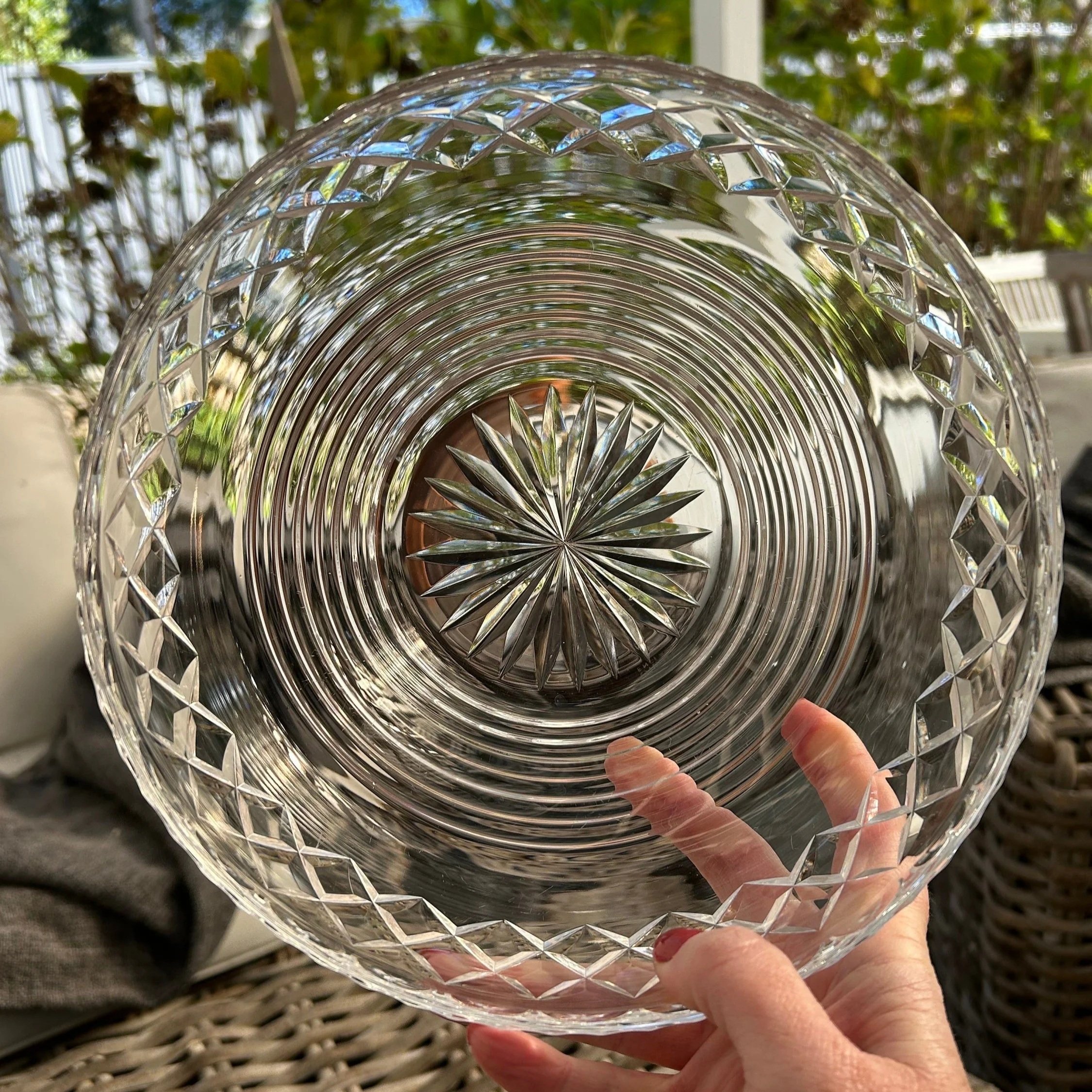Top-down view of clear crystal bowl showing concentric rings and starburst base detail