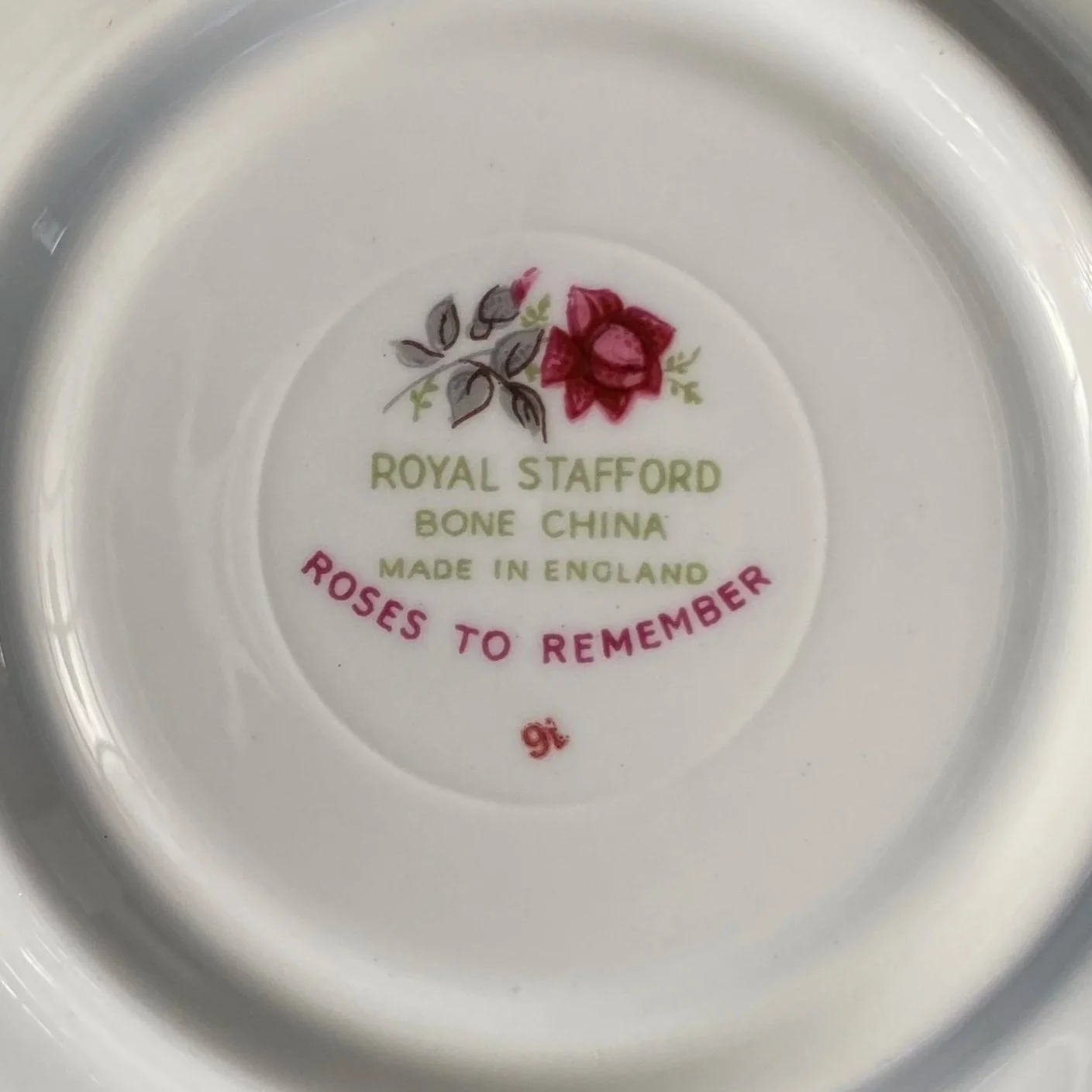 Close-up of “Royal Stafford Bone China” backstamp with rose graphic