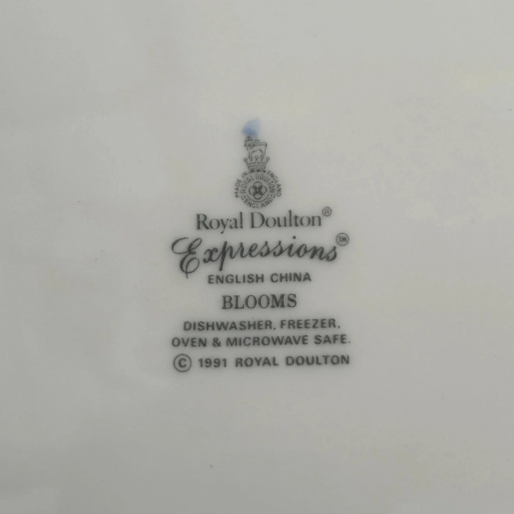 Close-up of the Royal Doulton Expressions backstamp on the underside, showing the Blooms pattern name and 1991 maker’s mark