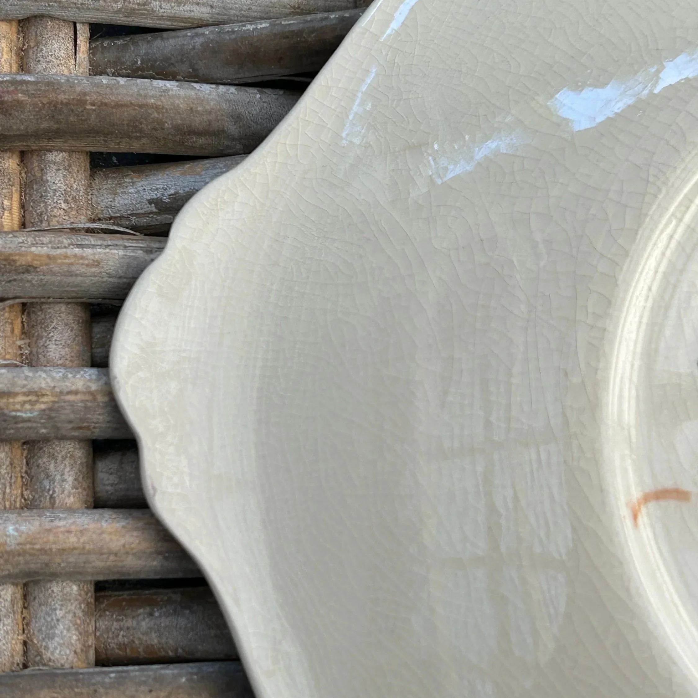 Handle shape detail showing embossed ridge and smooth glaze