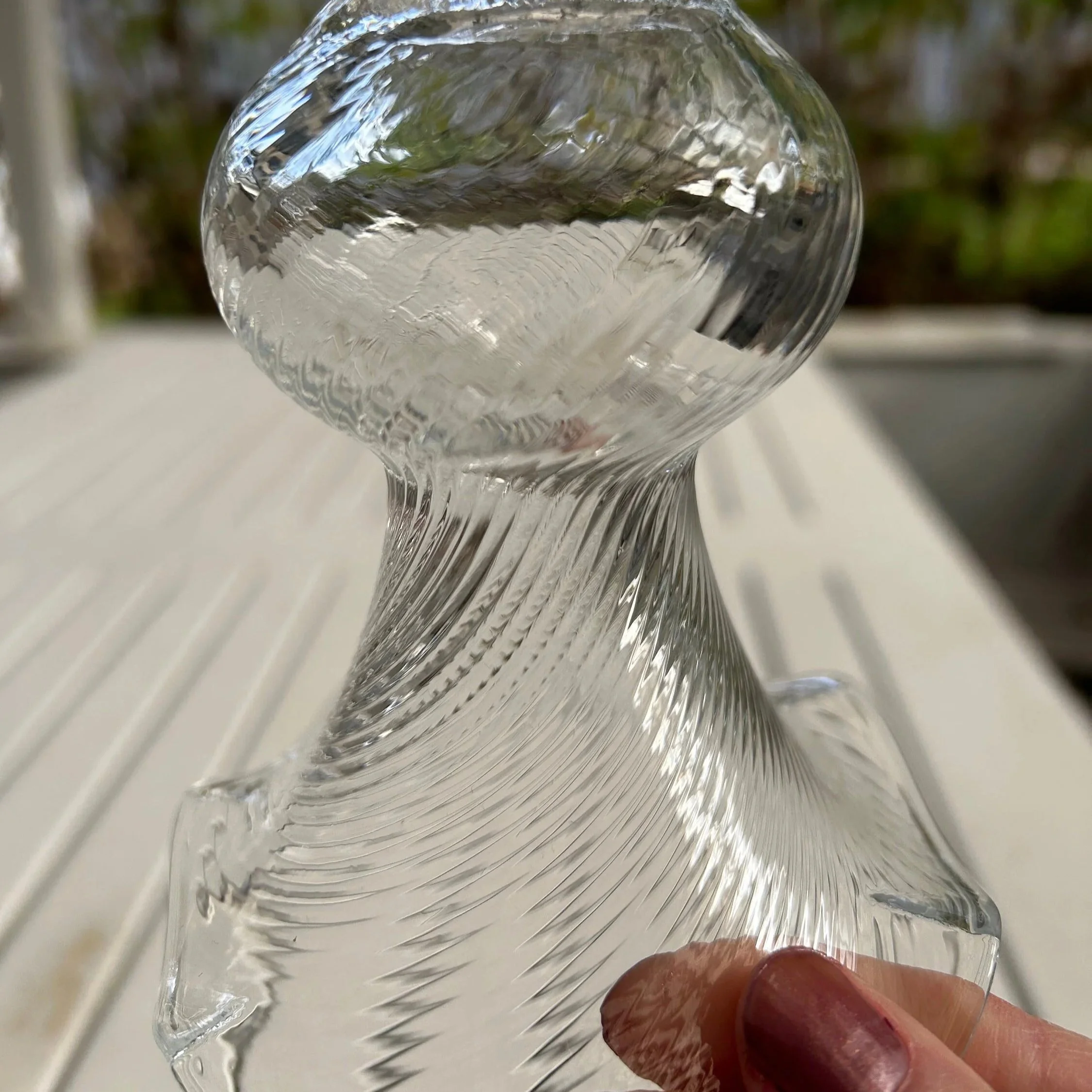 View from base highlighting bulbous shape and glass clarity