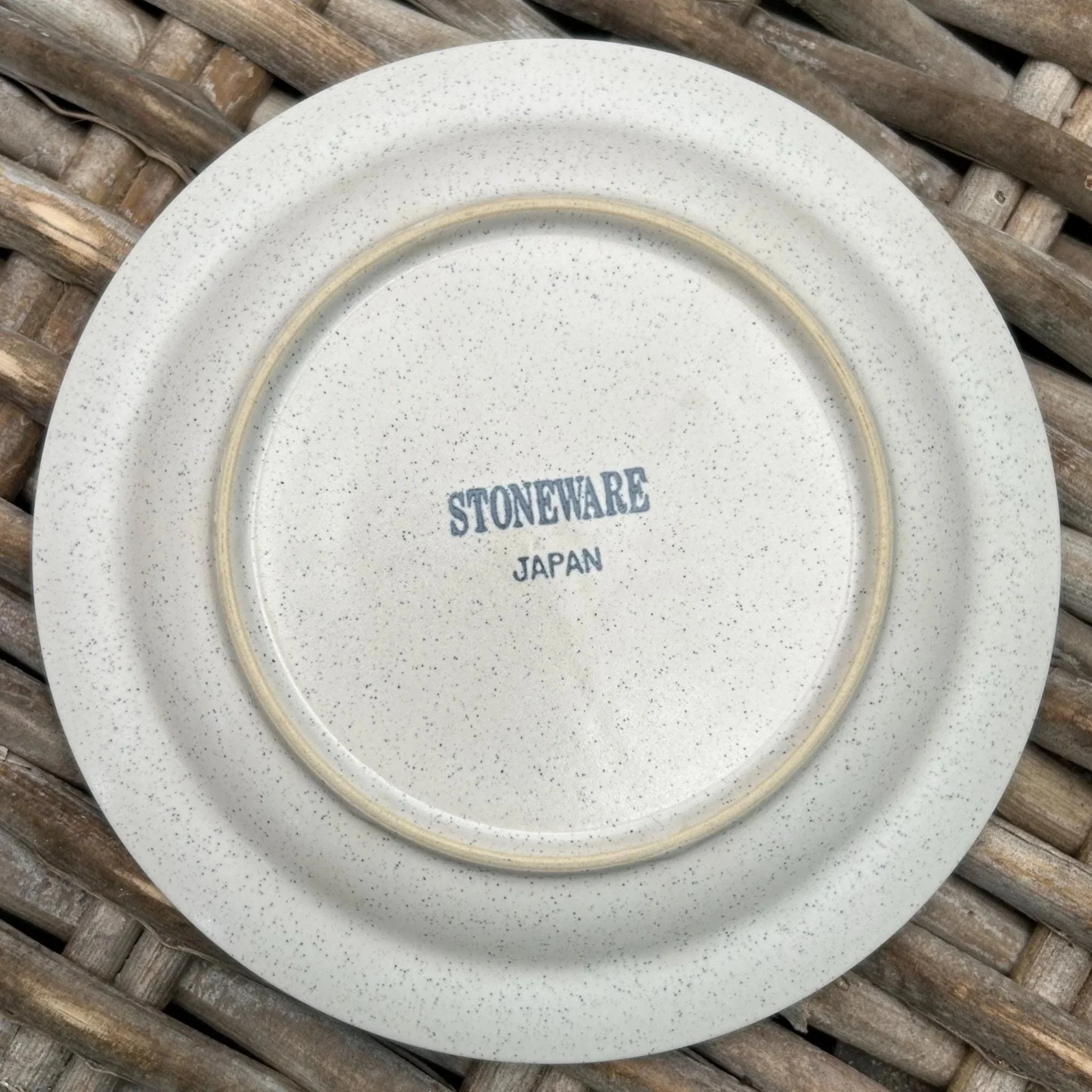 Underside of saucer with visible “Stoneware Japan” backstamp
