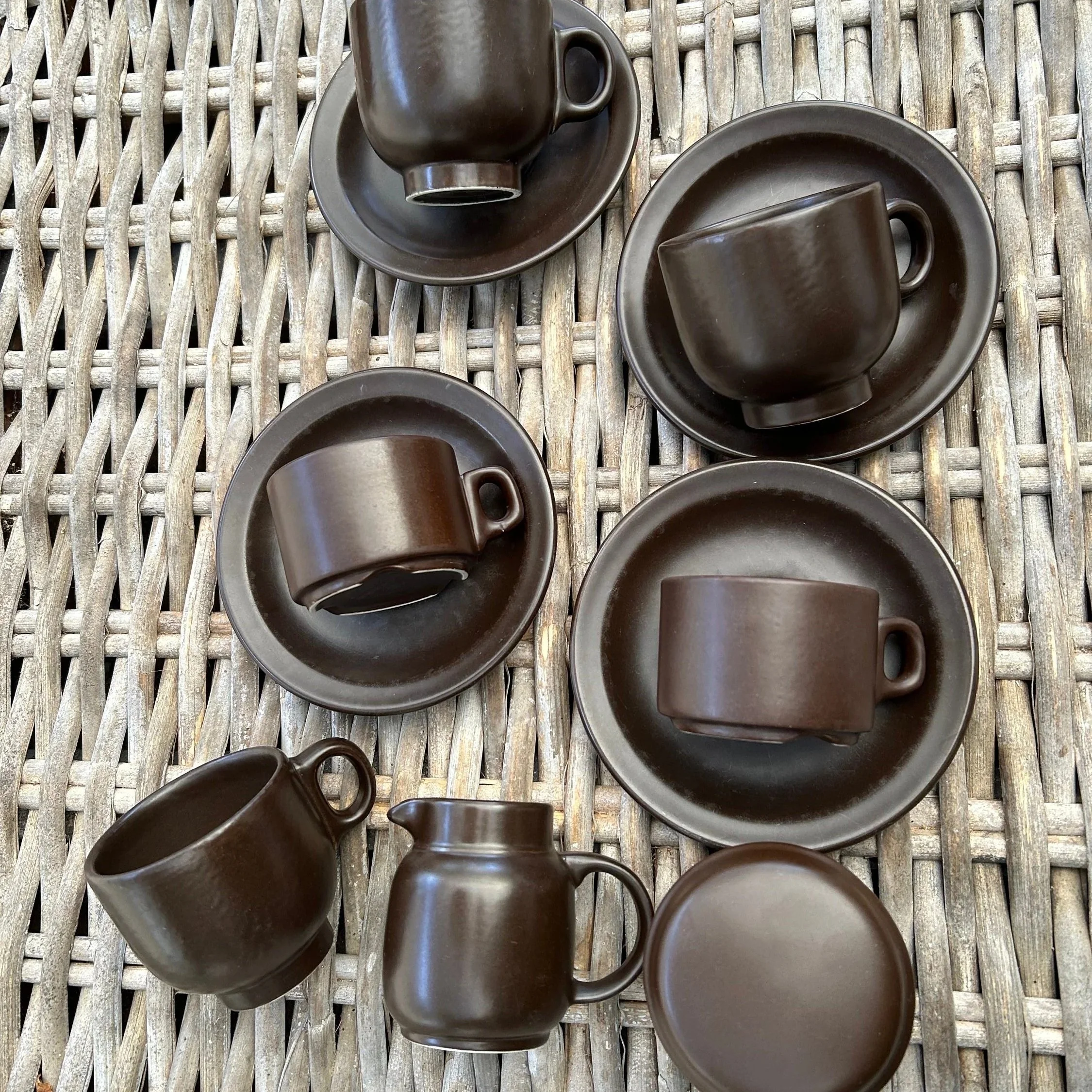 Flat lay of full set including four cups and four saucers