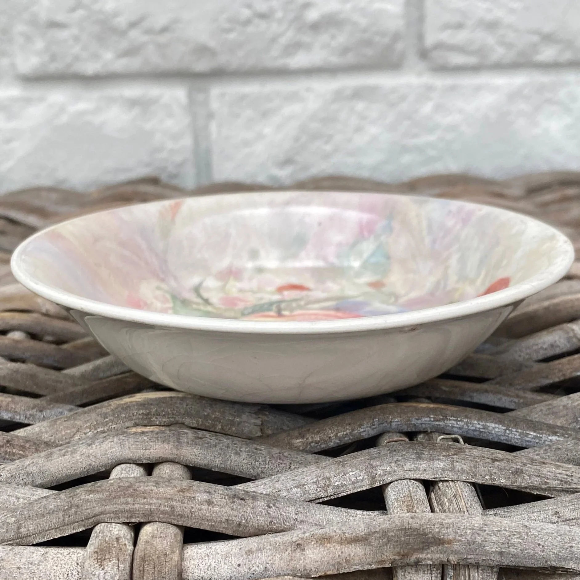 Side profile of shallow English earthenware fruit bowl