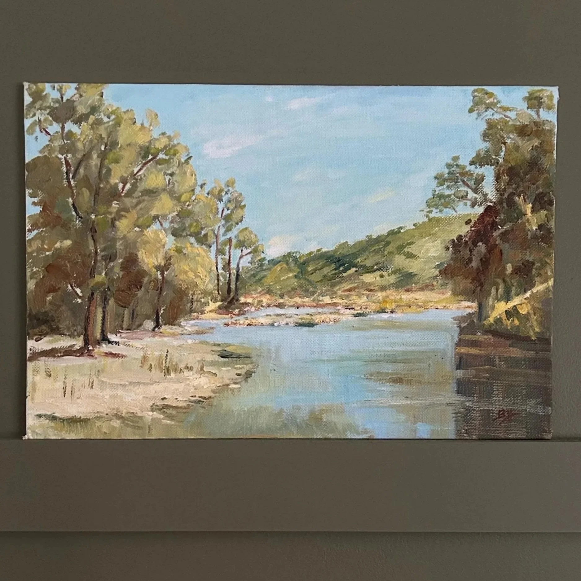 Full view of “Peaceful Waters” oil painting showing river and trees