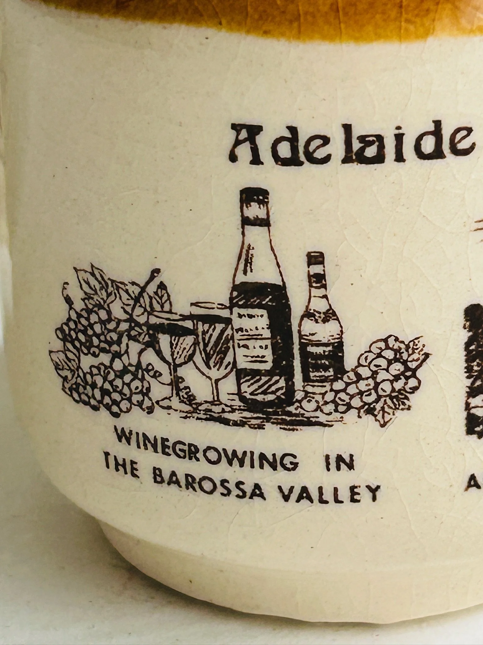 Close-up of the vineyard and bottle illustration with the text “Winegrowing in the Barossa Valley” printed on the shaker.